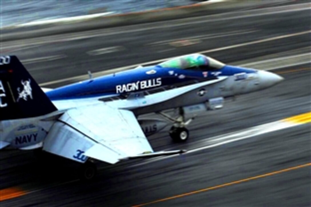 An F/A-18 Hornet from the "Bulls" of Strike Fighter Squadron lands on the flight deck of the Nimitz-class aircraft carrier USS Dwight D. Eisenhower, Nov. 17, 2008. 