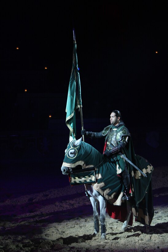 The Green Knight, the foe and villain of the show, takes a stance with his horse to claim his territory among his fans at Medieval Times Nov. 22.