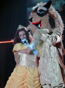 Technical Sgt. Chandra Smith, portraying 'Belle,' and Staff Sgt. Corey Simms, portraying 'The Beast,' sing a duet from the Walt Disney classic 'Beauty and the Beast." Sergeant Smith is a common support staff member assigned to the 162nd Fighter Wing Air National Guard, Davis-Monthan Air Force Base, Ariz. Sergeant Simms is a computer systems analyst assigned to the 994th Communications Flight, Luke Air Force Base, Ariz. Tops in Blue performed at Andrews Air Force Base Nov. 14 and 15. (U.S. Air Force photo by Bobby Jones)