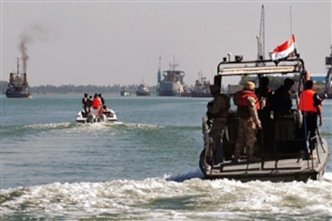 U.S. Navy sailors participate in a joint river patrol with their counterparts from the Iraqi Coast Guard and Iraqi Police in the Shatt al' Arab River in Basra, Iraq, Nov. 19, 2008. The sailors are assigned to Naval Special Operations Group.