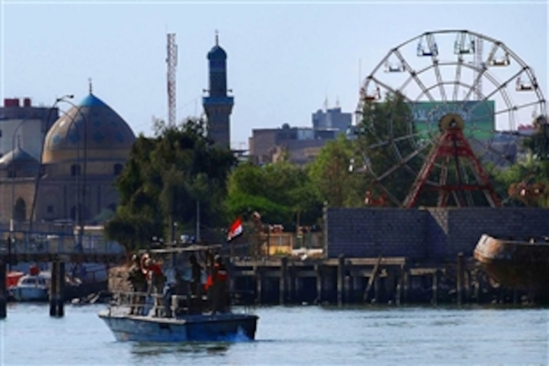 U.S. Navy sailors participate in a joint river patrol along with their counterparts from the Iraqi coast guard and police in the Shatt al-Arab River in Basra, Iraq, Nov. 19, 2008. The sailors are assigned to the Naval Special Operations Group.