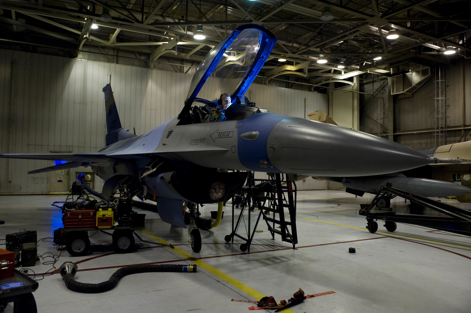 Senior Airman Jonathan Modler trouble shoots the electronic system on a F-16 Fighting Falcon Nov. 21, 2008, at Eielson Air Force Base, Alaska. The 354th Maintenance Squadron avionics flight is responsible for maintaining navigation and weapon system electronics on F-16 Aggressors of the 18th Aggressor Squadron enabling them to be mission-ready. He is assigned to the 354th Maintenance Squadron avionics flight.  (U.S. Air Force photo/Senior Airman Jonathan Snyder)