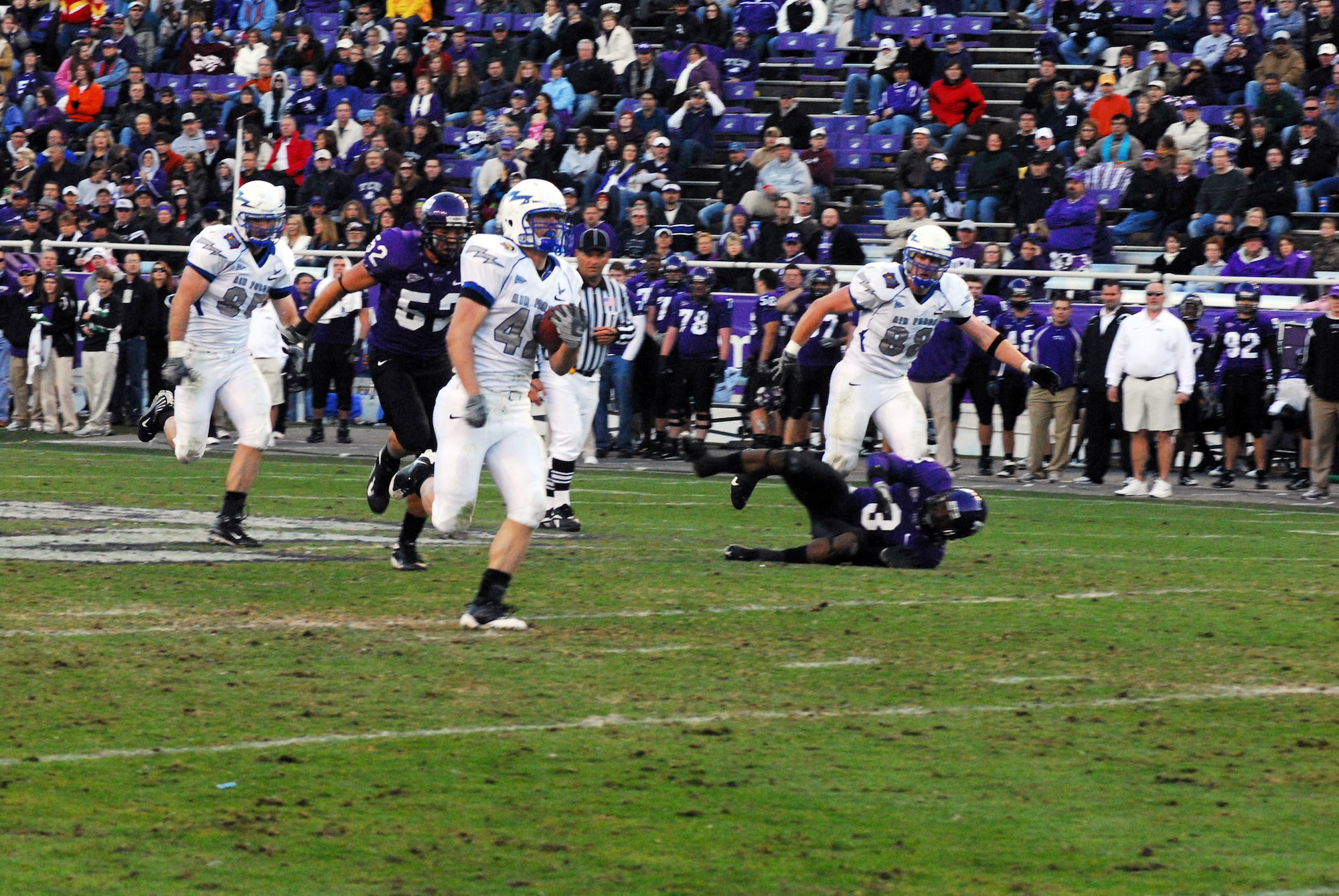 Air Force Academy fullback Jared Tew scampers for 57 yards to score the Falcon's only touchdown late in the fourth quarter against Texas Christian University in Amon G. Carter Stadium at Fort Worth, Texas. TCU beat the Falcons 44-10. (U.S. Air Force photo/Tech. Sgt. Julie Briden-Garcia)