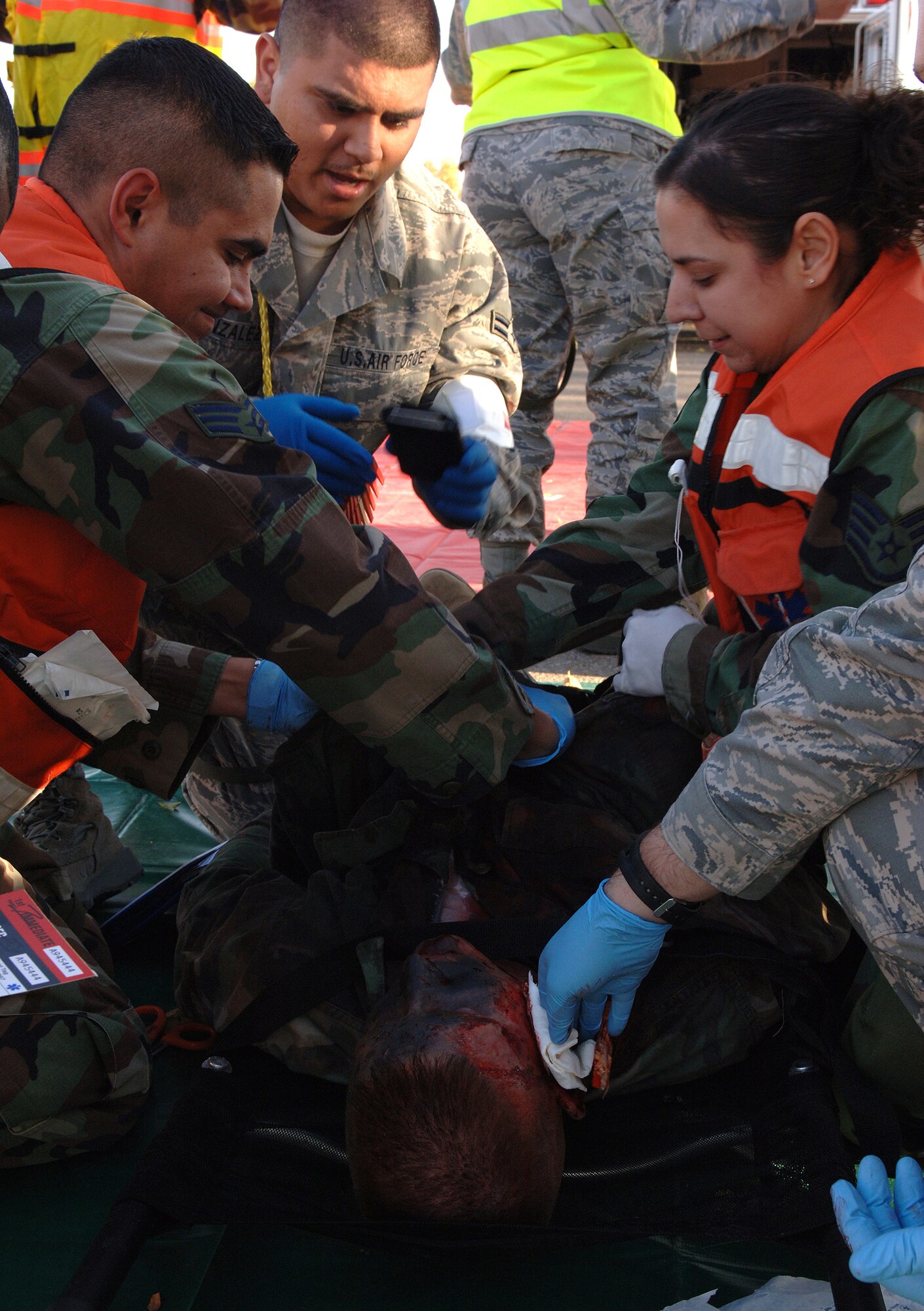 Airmen from the 49th Medical Group respond to a simulated explosion at Holloman Air Force Base, N.M., Nov. 20. The Airmen were participating in a week-long exercise, Coronet Gold Rush 08-08, to test their skills in the most realistic manner possible. (U.S. Air Force photo/Airman 1st Class Michael Means)