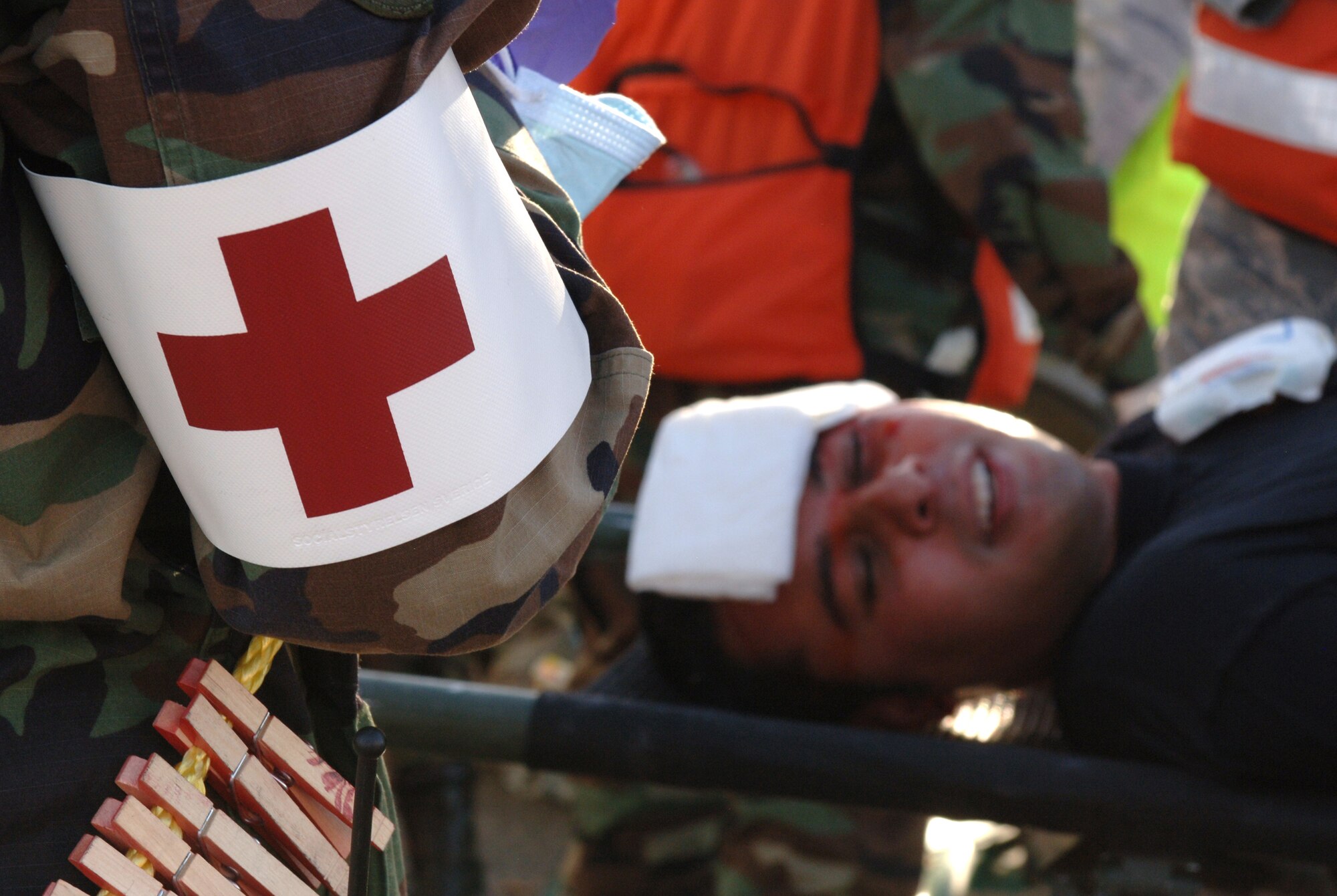 Airmen from the 49th Medical Group respond to a simulated explosion at Holloman Air Force Base, N.M., Nov. 20. The Airmen were participating in a week-long exercise, Coronet Gold Rush 08-08, to test their skills in the most realistic manner possible. (U.S. Air Force photo/Airman 1st Class Michael Means)
