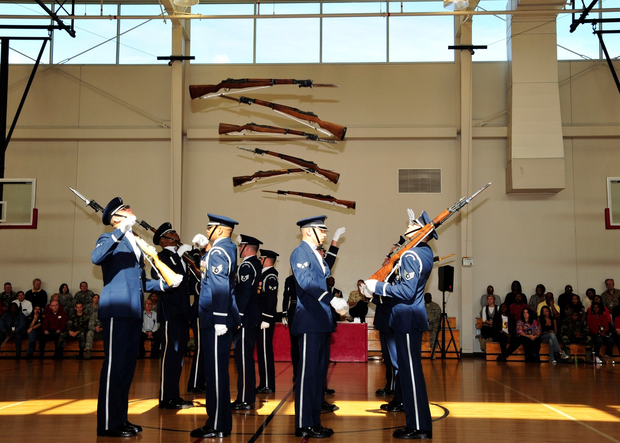 The Air Force Honor Guard Drill Team entertains a crowd at the Los Angeles AFB Fitness Center, Nov. 21. This week, the team was in Los Angeles supporting Air Force Week events in Southern California. (Photo by Lou Hernandez).