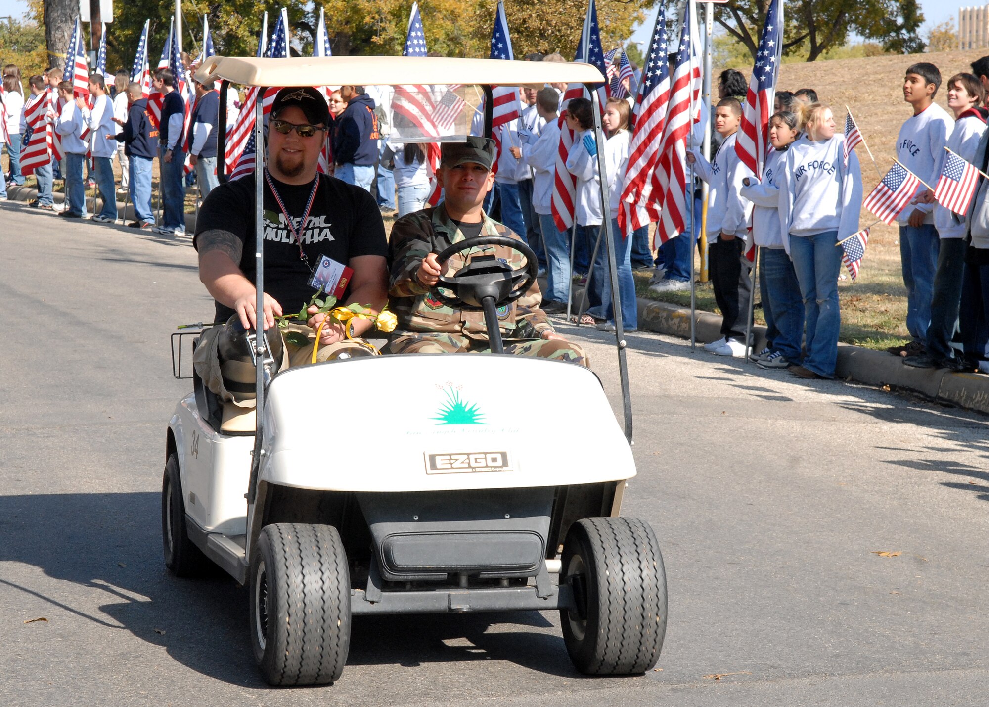 A wounded warrior rides with a military escort from Goodfellow Air Force Base in the Hunt for Heroes parade through downtown San Angelo on Nov. 21.  The parade gave members of the Goodfellow and San Angelo communities the opportunity to come out and show support for the wounded warriors who were participating in the hunt.  (U.S. Air Force photo by Senior Airman Kasabyan Musal).