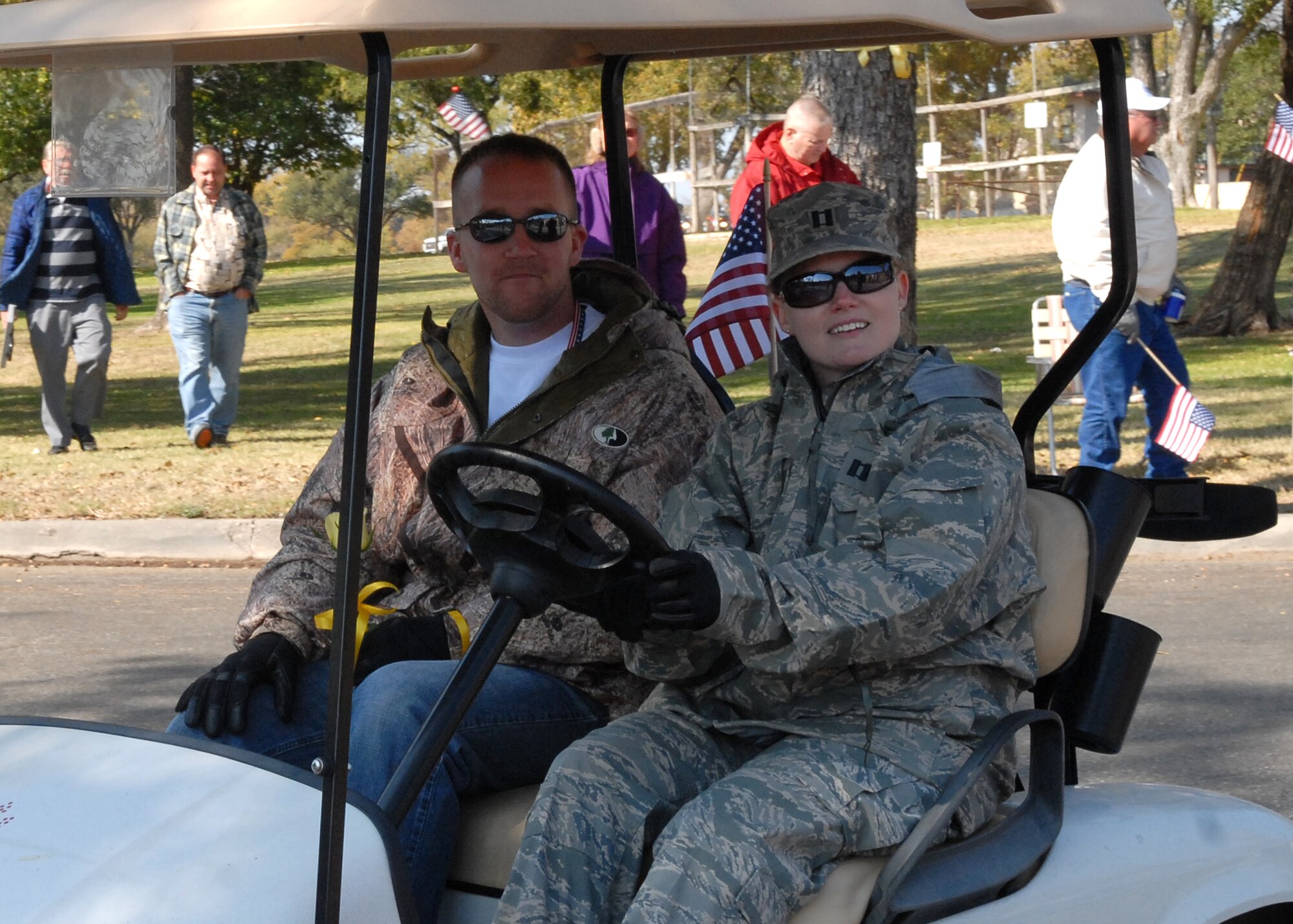 A wounded warrior rides with a military escort from Goodfellow Air Force Base in the Hunt for Heroes parade through downtown San Angelo on Nov. 21.  The parade gave members of the Goodfellow and San Angelo communities the opportunity to come out and show support for the wounded warriors who were participating in the hunt.  (U.S. Air Force photo by Senior Airman Kasabyan Musal).