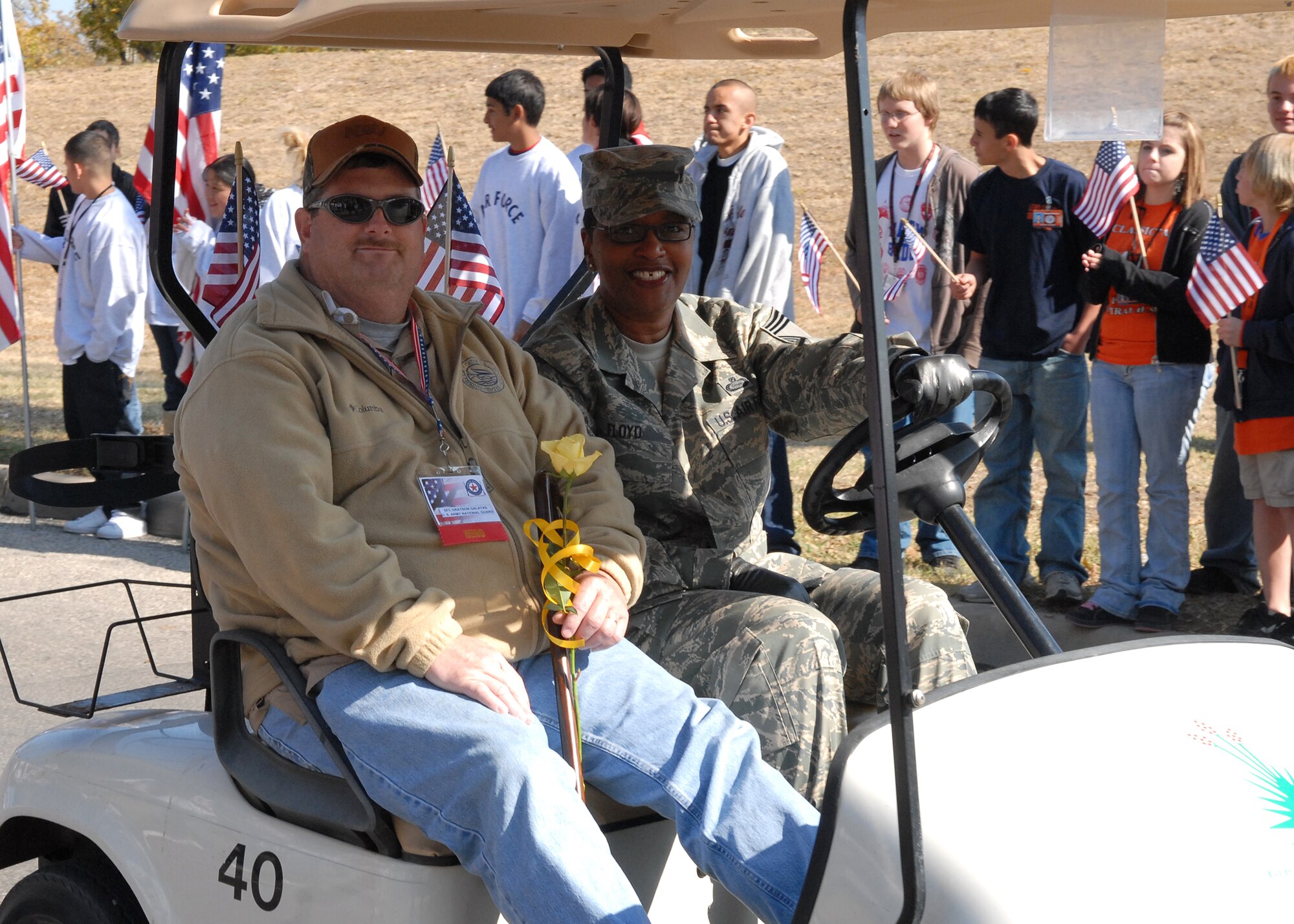 A wounded warrior rides with a military escort from Goodfellow Air Force Base in the Hunt for Heroes parade through downtown San Angelo on Nov. 21.  The parade gave members of the Goodfellow and San Angelo communities the opportunity to come out and show support for the wounded warriors who were participating in the hunt.  (U.S. Air Force photo by Senior Airman Kasabyan Musal).