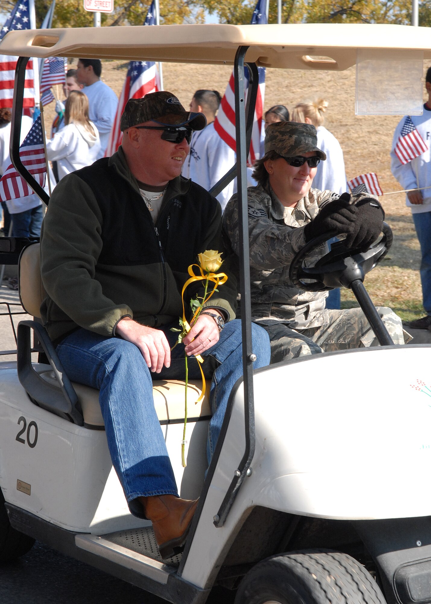 A wounded warrior rides with a military escort from Goodfellow Air Force Base in the Hunt for Heroes parade through downtown San Angelo on Nov. 21.  The parade gave members of the Goodfellow and San Angelo communities the opportunity to come out and show support for the wounded warriors who were participating in the hunt.  (U.S. Air Force photo by Senior Airman Kasabyan Musal).