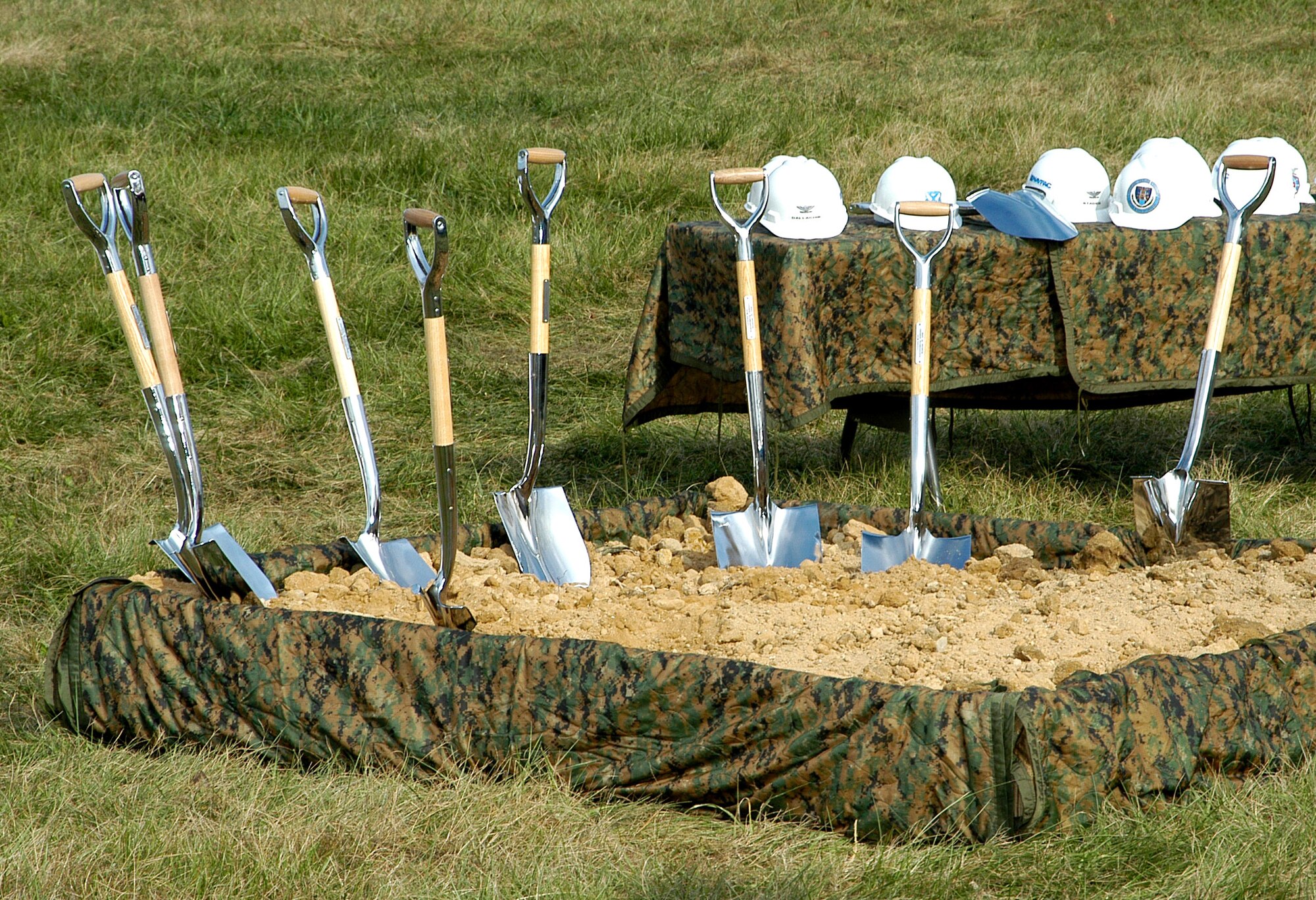 Senior agency representatives from the Air Force Office of Special Investigations, the Army's Criminal Investigative Command, the Defense Security Service, the Naval Criminal Investigative Service, and elements of the Defense Intelligence Agency armed up with shovels and jointly turned the first soil for the new Military Department Investigative Agencies facility located at Marine Corps Base Quantico, Va.
