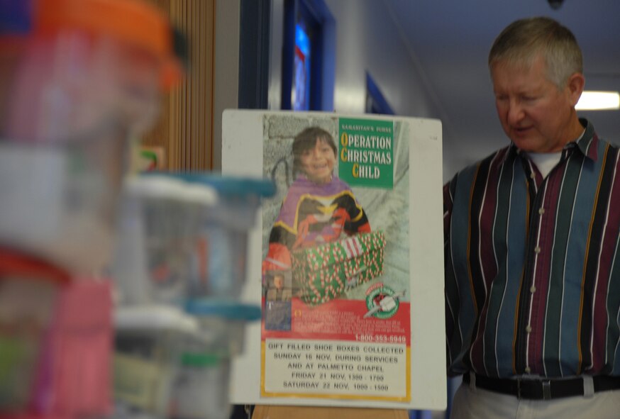 SHAW AIR FORCE BASE, S.C. -- Operation Christmas Child has been giving under-privileged children a more joyful Christmas since 1993.  Shaw AFB adopted the program in 1994. "I would like to break the 500 mark this year for donated shoeboxes," said Hugh Wilson, young adult ministry coordinator at the Palmetto chapel. "We've gotten 400 in the past." Every shoebox includes the Christmas story translated into the child's native language. (U.S. Air Force photo/2nd Lt. Emily Chilson)
