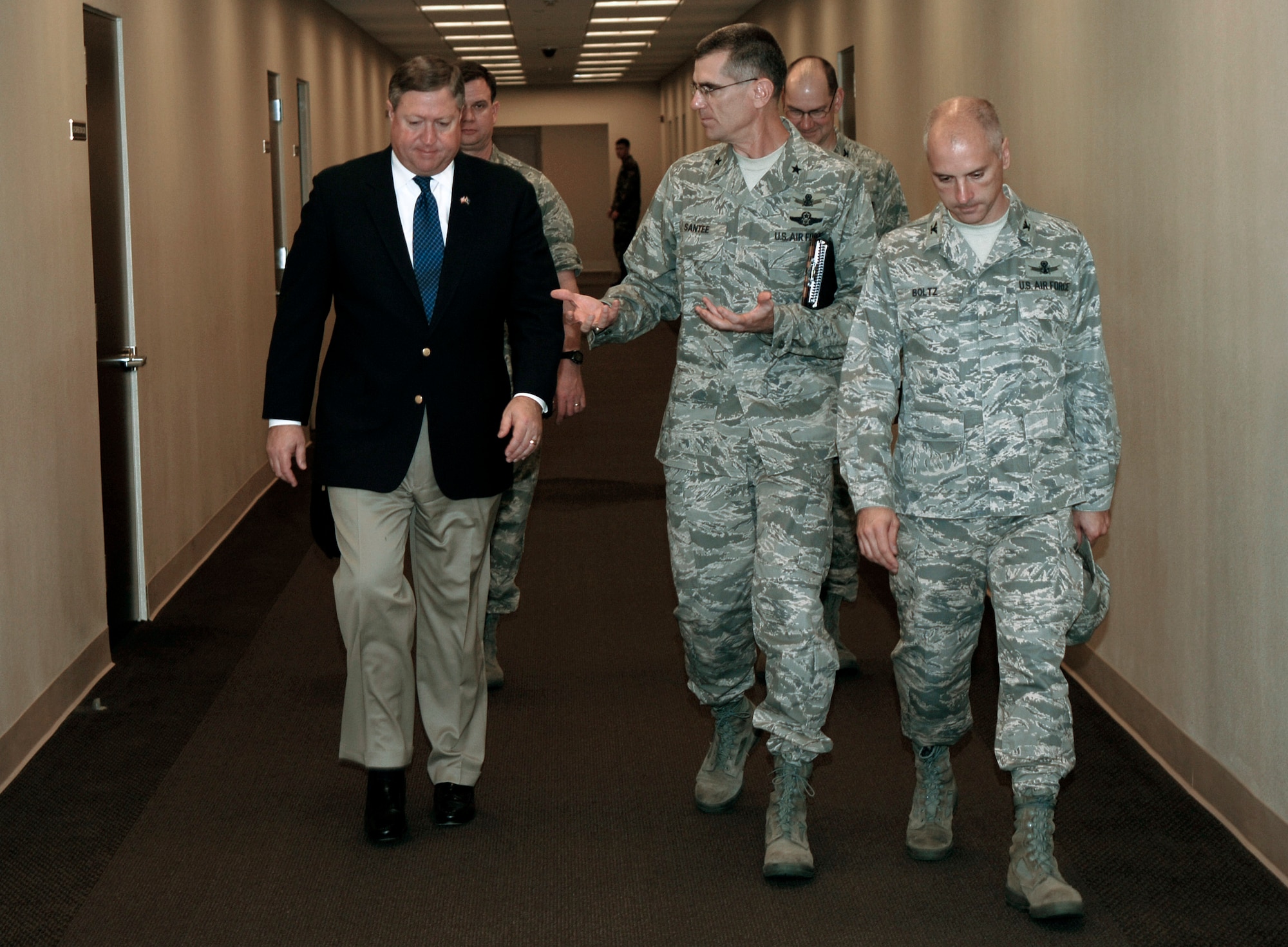 Secretary of the Air Force Michael B. Donley toured the Joint Space Operations Center Nov. 22 with Brig. Gen. Jay Santee (center), 14th Air Force vice commander, and Col. Richard Bolz (right), 614th Air and Space Operations Center commander, during his visit to Vandenberg Air Force Base, Calif.  Secretary Donley visited the base to discuss future plans on how the JSpOC and 14th Air Force teams can continue to help combat Airmen in missions abroad. (U.S. Air Force photo/Airman 1st Class Jonathan Olds)
