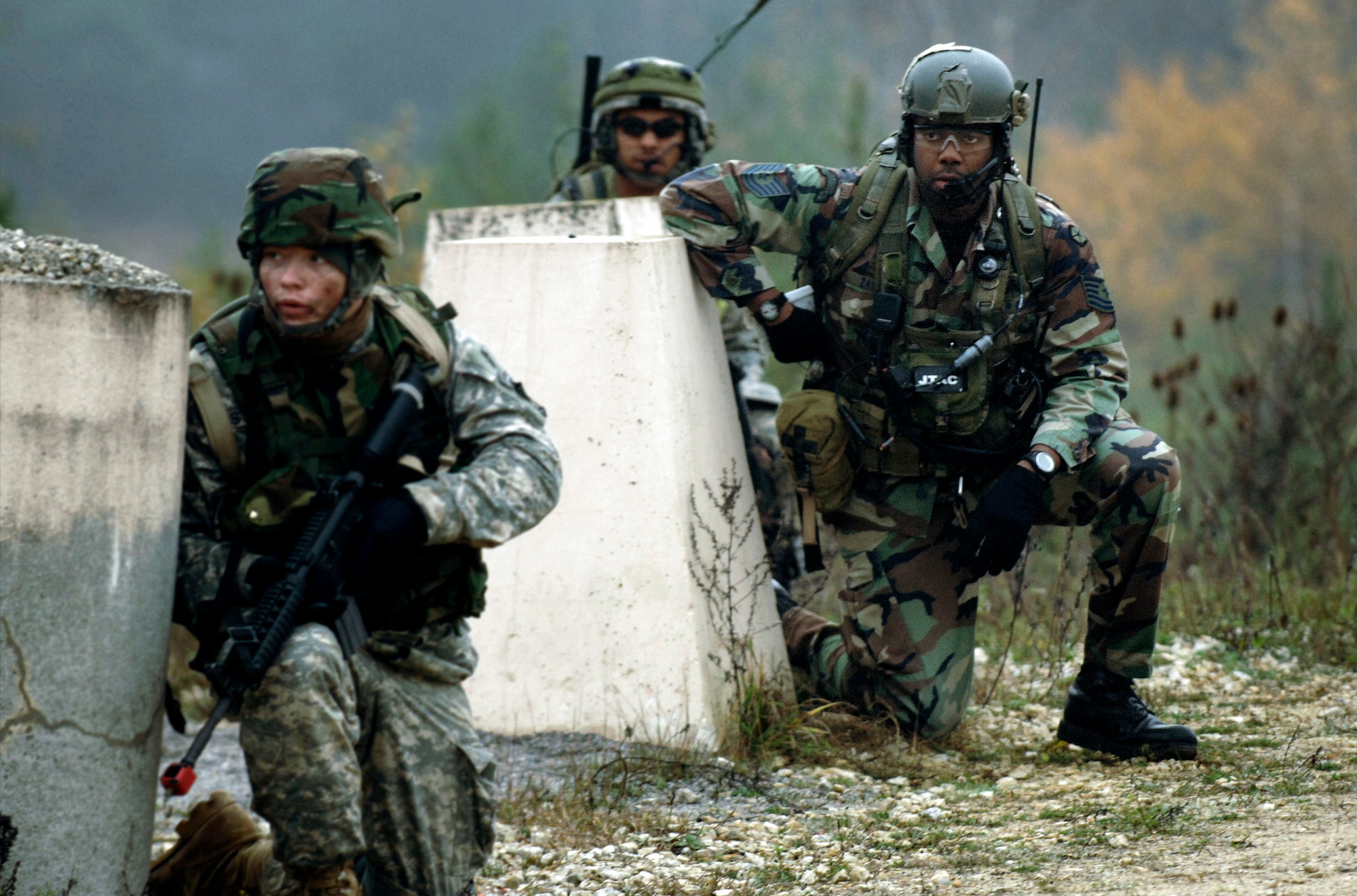 Tech. Sgt. Robert Zackery evaluates an urban warfare scenario involving joint terminal air controller and Army Soldiers during Exercise Allied Strike II Nov. 6 at Hohenfels Army Garrison, Germany. The U.S. Soldiers with 173rd Air Brigade Combat Team, 191 Cavalry, provided a sense of realism to the week-long JTAC-centric exercise designed to prepare U.S. Air Forces Europe and NATO JTACs for Operation Iraqi Freedom and Operation Enduring Freedom. Sergeant Zachery is the chief JTAC instructor for the 4th Air Support Operations Group in Heidelberg, Germany. (Defense Department photo/Master Sgt. Scott Wagers) 
