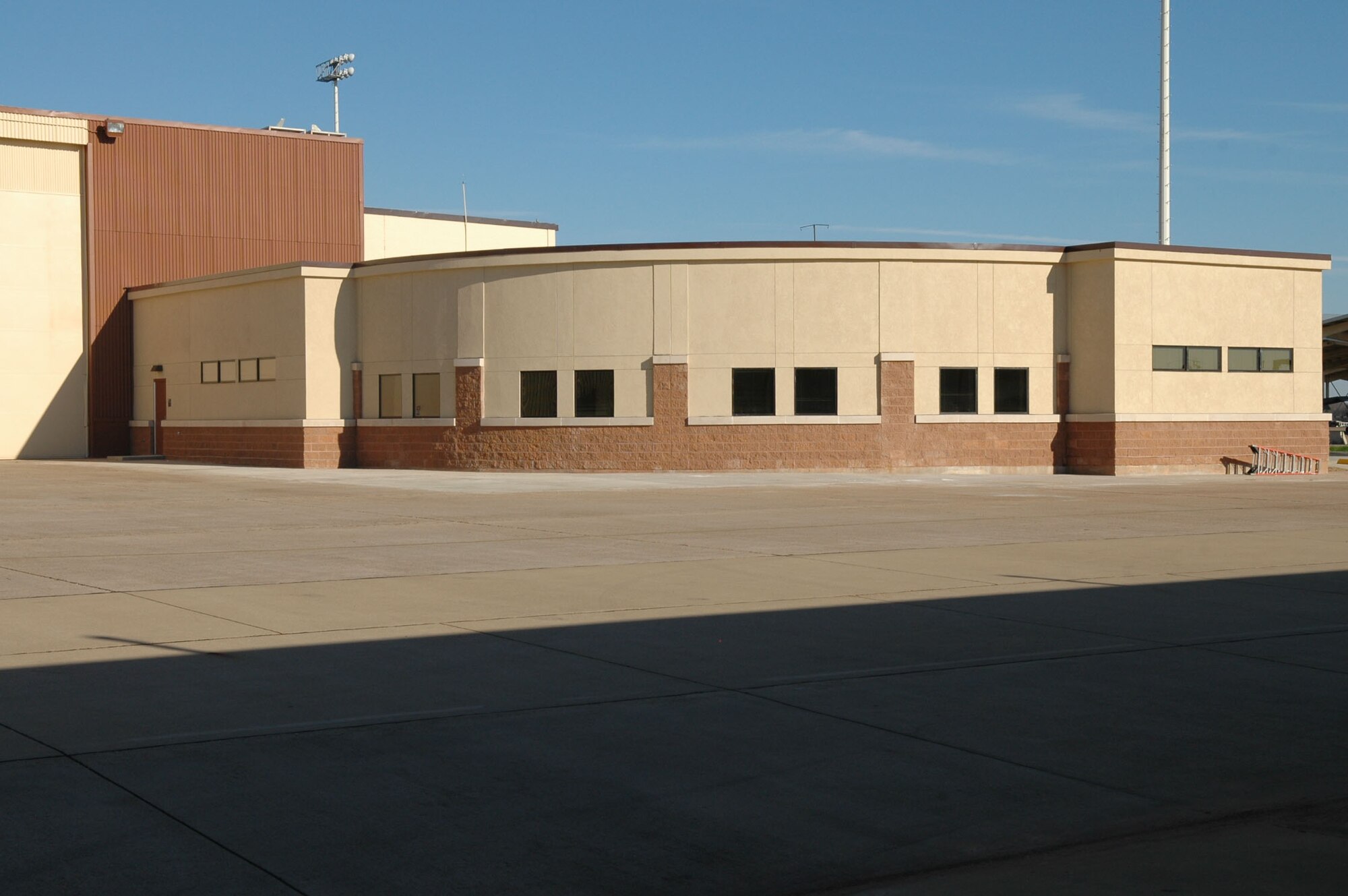 The new 717th AMXS building will have a huge break room, a training room with computers set up solely for training, a conference room, and offices for the maintenance officer, superintendant, and production supervisors.  The rear of the building is curved because the A-10’s needed wing tip clearance to get into the hangar.
