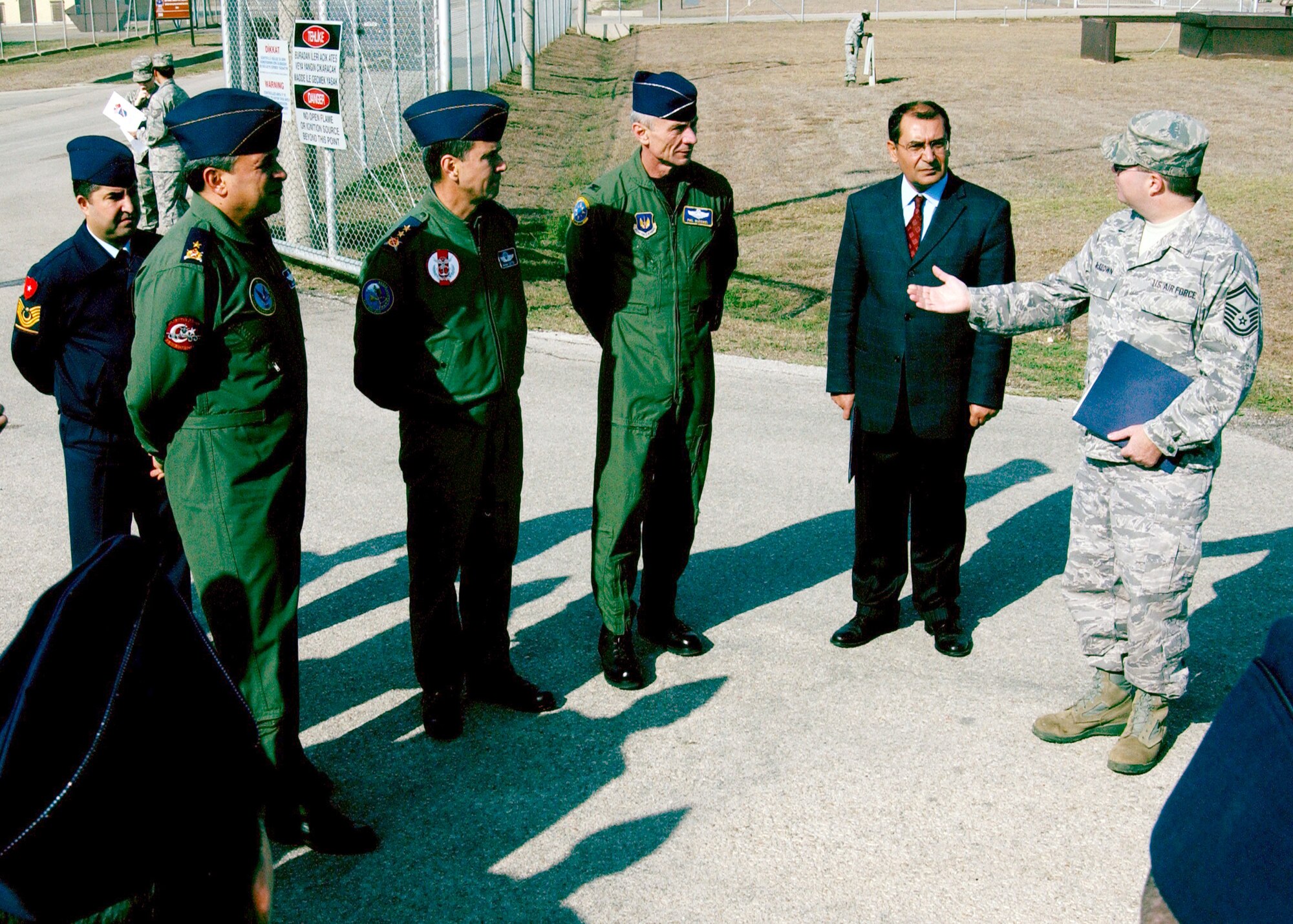 Senior Master Sgt. Patrick J. McKeown, 39th Logistics Readiness Squadron Fuels Management Flight chief, gives Maj. General Mehmet Cetin, Defense Econmic Cooperation Agreement inspection team chief, Brig. General Haluk Selvi, 10th Tanker Base Commander and Col. Phil McDaniel, 39th Air Base Commander, an overview of the 39 LRS bulk fuel storage area. (U.S. Air Force photo by Staff. Sgt. Chris Galindo)