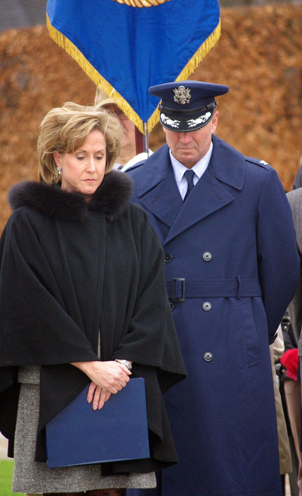 Col.Tip Wight, 52nd Fighter Wing commander, stands with Ann Wagner, U.S. ambassador to Luxembourg, during a moment of silence on Nov. 11. (U.S. Air Force photo by Staff Sgt. Matthew Bright)