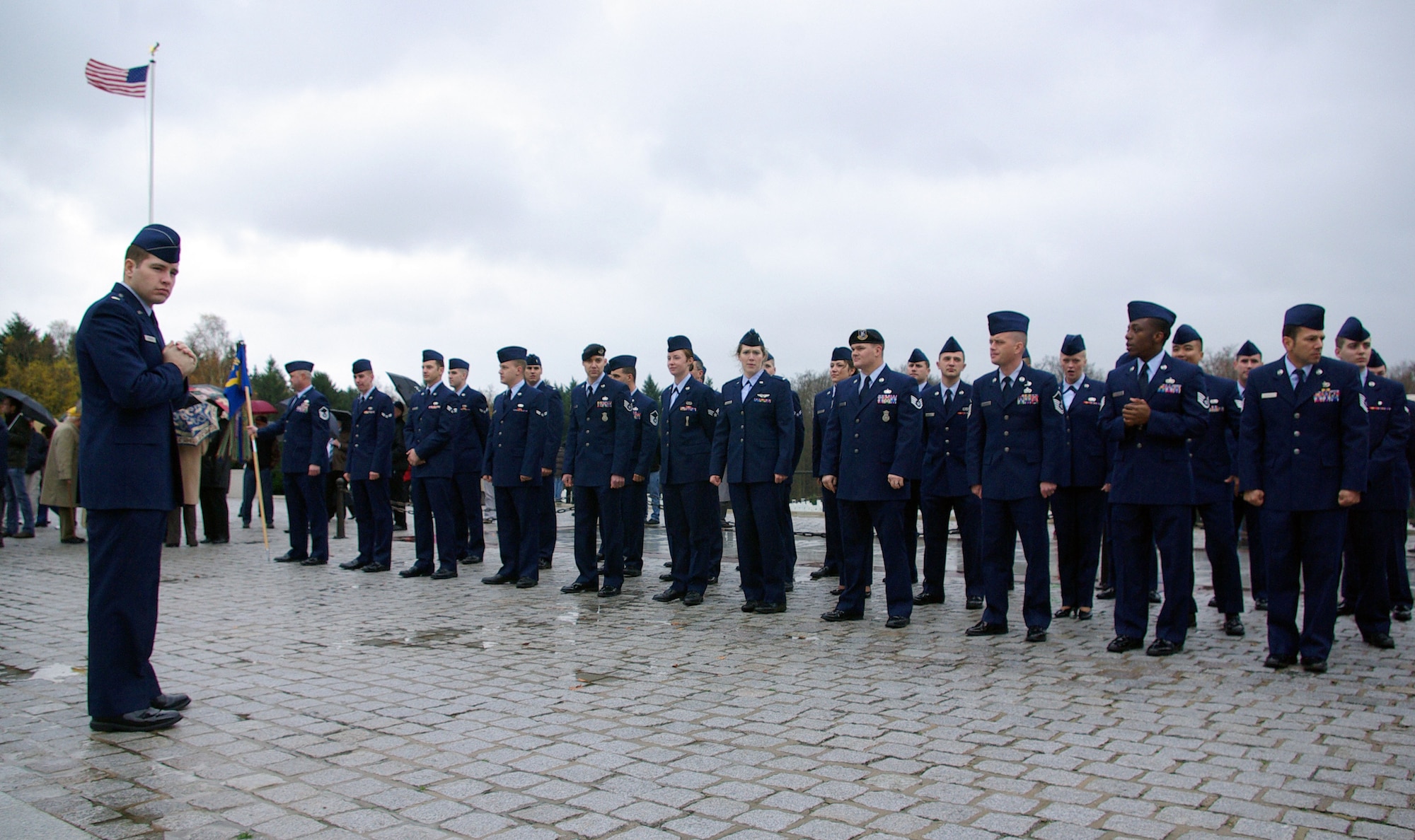 Members of the 52nd Fighter Wing wait for the Veteran’s Day ceremony to start at the Luxembourg American Cemetery on Nov. 11, 2008. The ceremony honored the fallen soldiers overseas during World War II. (U.S. Air Force photo by Staff Sgt. Matthew Bright)