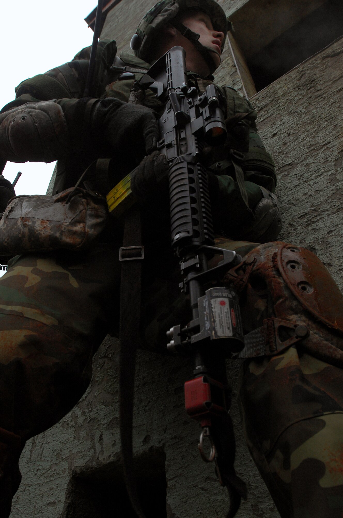 Airman 1st Class Chris Cunningham, 423rd Security Forces Squadron, Royal Air Force Alconbury, England, leads his fire team into a building during urban operations training as a part of a two-week long Creek Defender course Nov. 18, 2008, Baumholder, Germany. (U.S. Air Force photo by Airman 1st Class Kenny Holston)