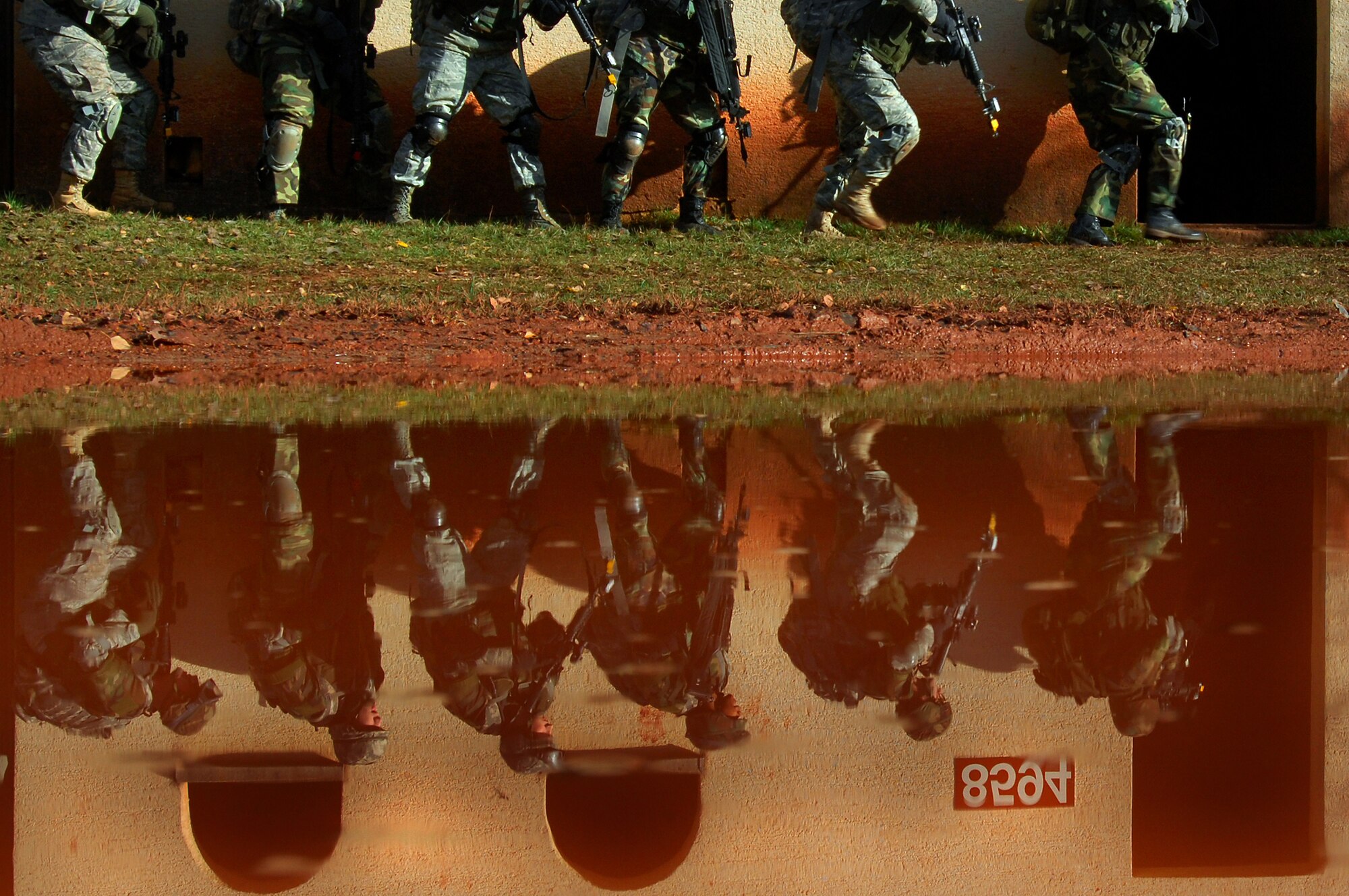 Security Forces Squadron members participate in urban operations as a part of a two-week long Creek Defender course, Nov. 17, 2008, Baumholder, Germany. (U.S. Air Force photo by Airman 1st Class Kenny Holston)