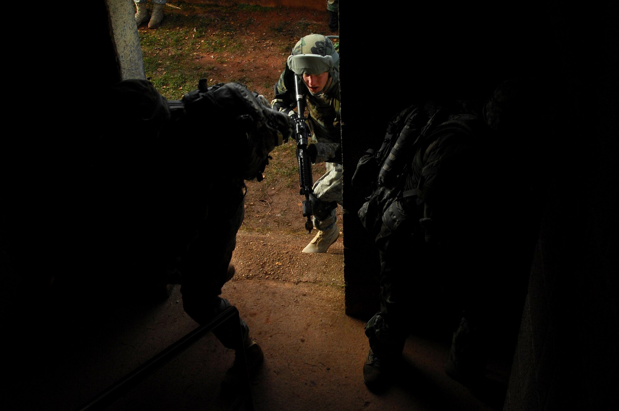 Security Forces Squadron members participate in urban operations as a part of a two-week long Creek Defender course, Nov. 17, 2008, Baumholder, Germany. (U.S. Air Force photo by Airman 1st Class Kenny Holston)
