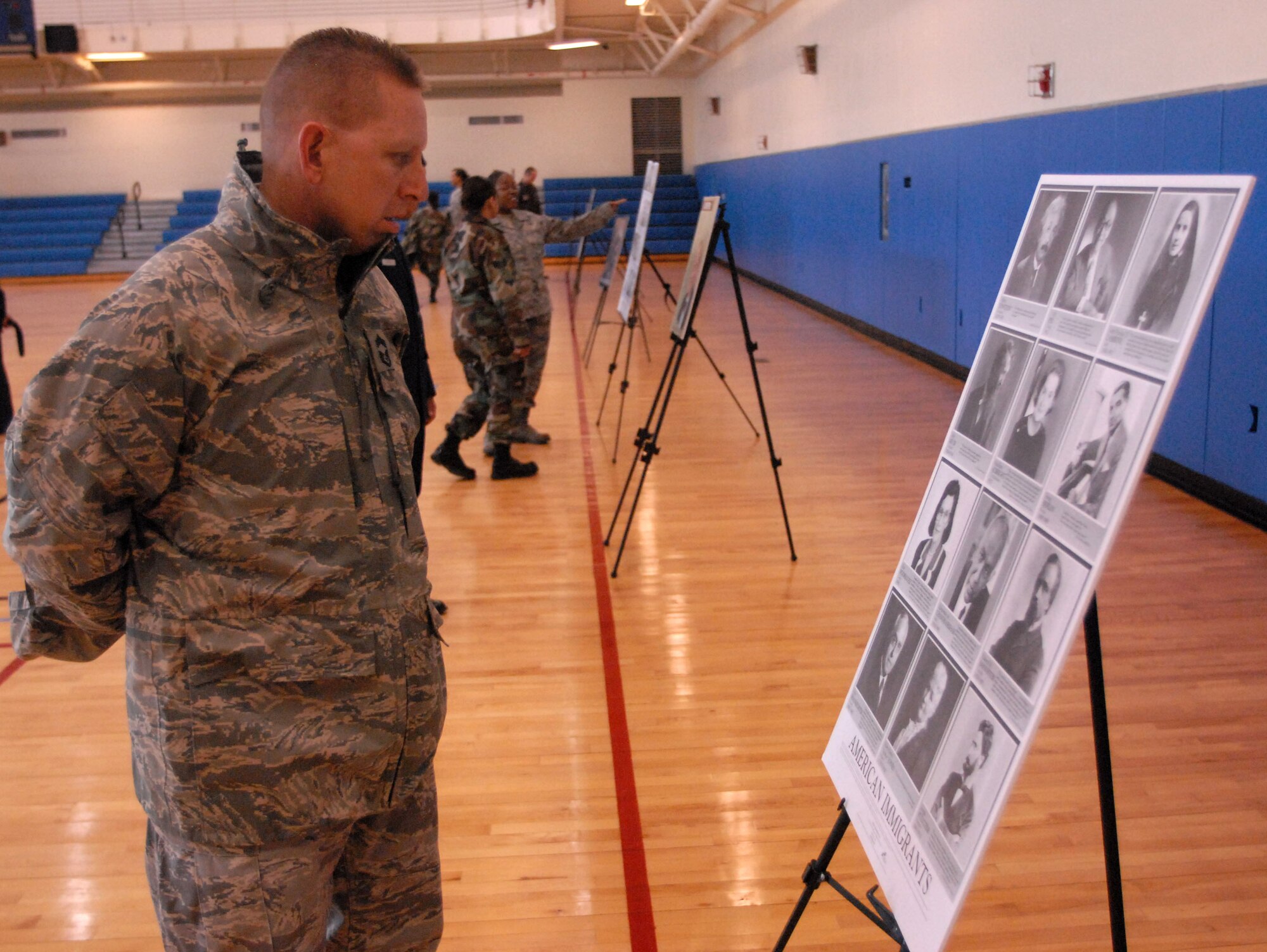 Chief Master Sgt. Michael Hayder, 8th Mission Support Group superintendent, looks at a cultural display during Diversity Day at Kunsan Air Base, Republic of Korea, Nov. 25, 2008. Diversity Day celebrates the many different cultures working together around the Air Force. (U.S. Air Force Photo/Senior Airman Gustavo Gonzalez) 
