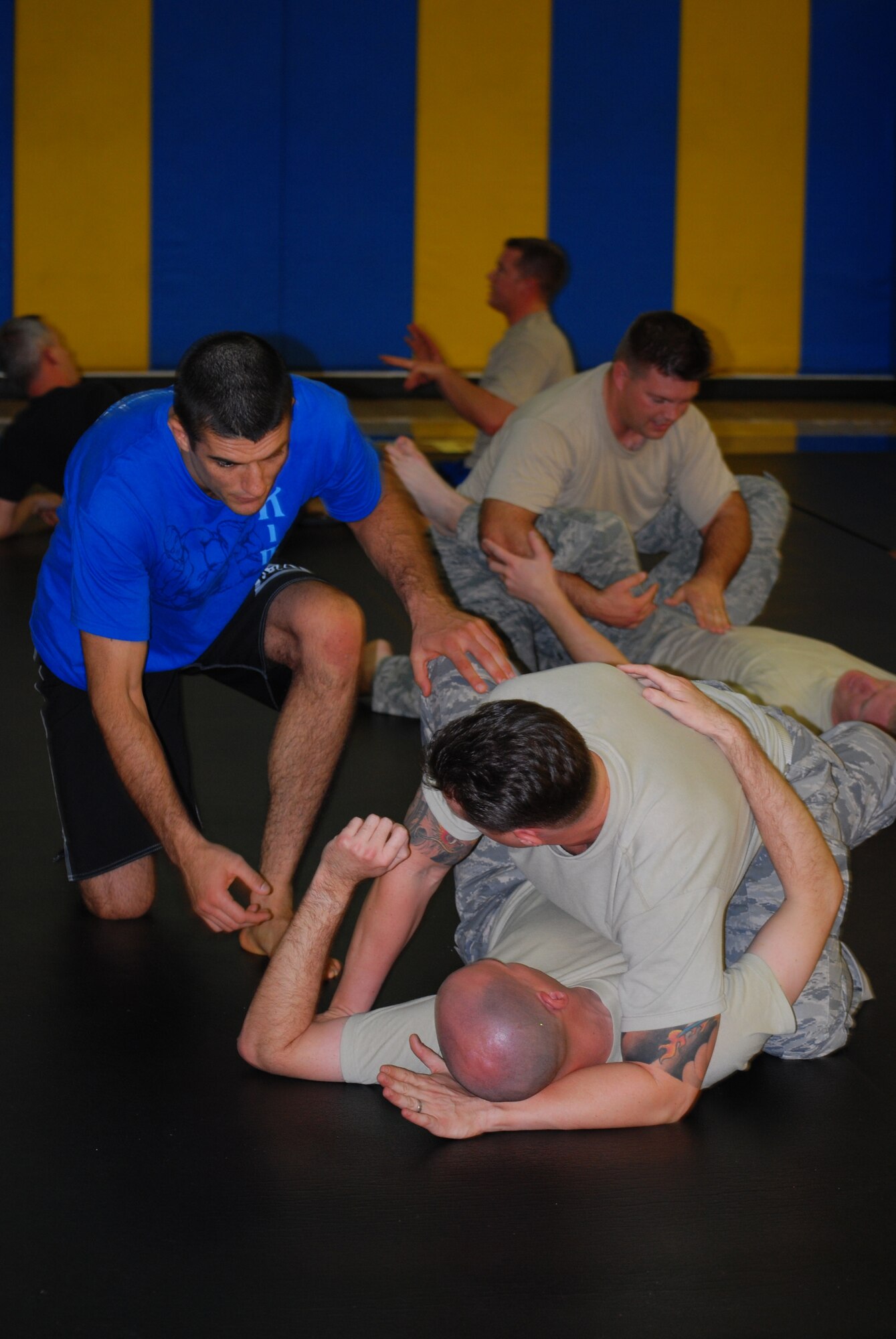 More than 30 individuals from the 570th Global Mobility Squadron  became certified as Gracie Jiu-Jitsu Combatives instructors aftera grueling week-long course here Nov. 17-21. (U.S. Air Force photo/1st Lt. Nicole Langley)
