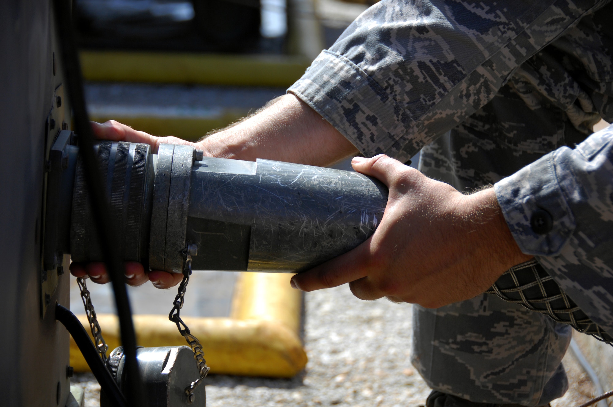 ANDERSEN AIR FORCE BASE, Guam - Senior Airman William Damron, 644th Combat Communications Squadron electrical power production, troubleshoots a generator during the squadron's Dragon Thunder field training exercise Nov. 20 here. The 644th Combat Communications Squadron is a self-sufficient squadron capable of moving into a bare-base environment and establishing operations within 24 hours. (U.S. Air Force photo by Senior Airman Shane Dunaway)