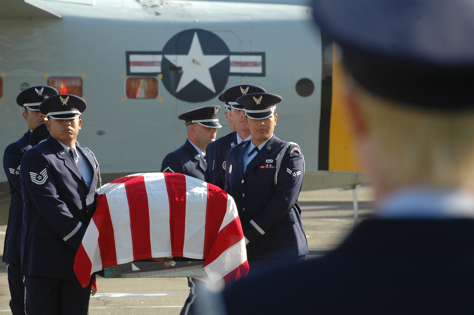 Members of the Travis Air Force Base Honor Guard perform paul bearer duties during a mock full honors funeral service. (U.S. Air Force photo/Staff Sgt. Shaun Emery)