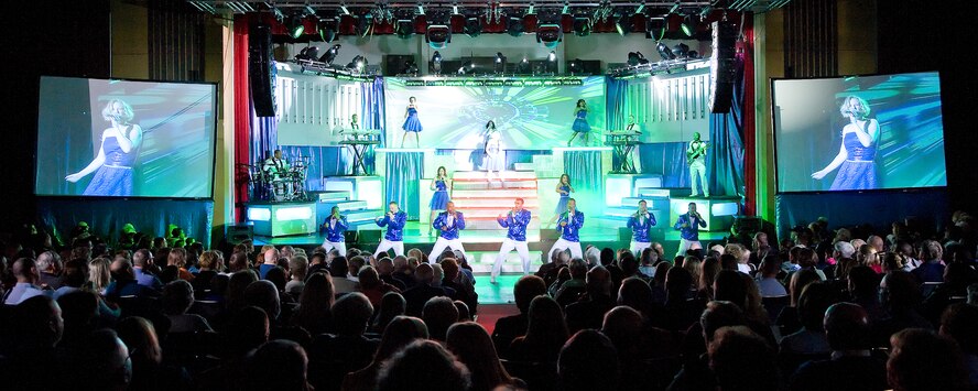 DOVER AIR FORCE BASE, Del. - Tops In Blue performed Nov. 19 in the Delaware State University Education and Humanities Center in Dover. Performers entertained the audience with 'Deja Blue' which featured Latin and American country music, Disney tunes and hits from several movies and Broadway shows. (U.S. Air Force photo/Jason Minto)