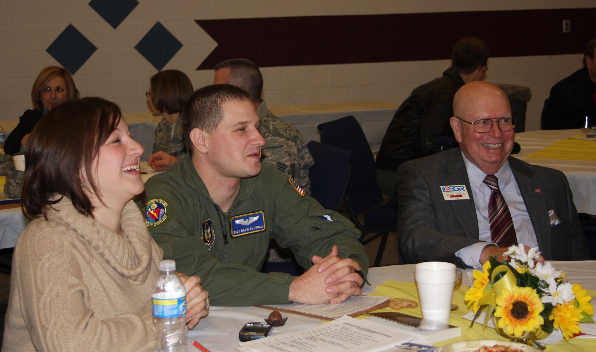 WRIGHT-PATTERSON AFB, Ohio - Staff Sgt. David Cherolis, 445th Aeromedical Evacuation Squadron, and his wife Mary talk with Mr. Woody Stroud, an Employer Support of the Guard and Reserve representative during the 445th Airlift Wing Yellow Ribbon Pre-Deployment Town Hall meeting Nov. 18 and 19, 2008. The town hall marked the first pre-deployment Yellow Ribbon Town Hall hosted by an Air Force Reserve Command unit. (Air Force photo/Laura Darden)(Air Force photo/Laura Darden)