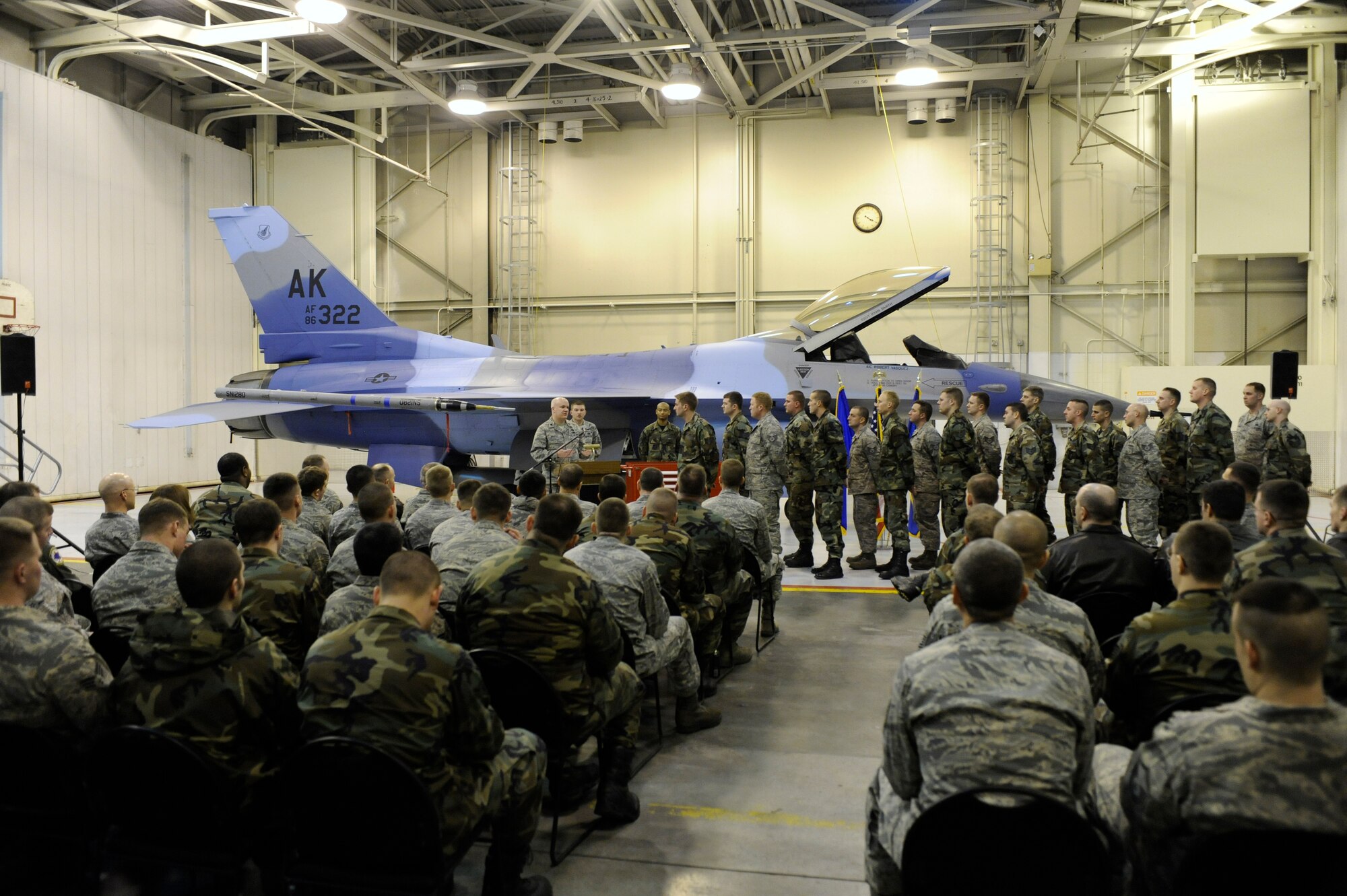 Lt. Col. Mark Murphy, 354th Maintenance Group  deputy commander, speaks to Airmen being honored during the dedicated crew chief ceremony Nov. 21, 2008, at Eielson Air Force Base, Alaska. Dedicated crew chiefs are responsible for the people who work for them, they are also responsible for every maintenance action on a particular aircraft: all the paperwork and most importantly for the aircraft's mission readiness.  (U.S. Air Force photo/Senior Airman Jonathan Snyder)