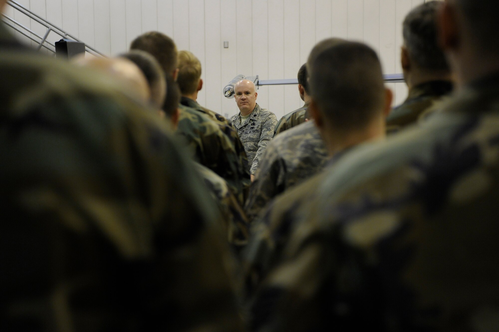 Lt. Col. Mark Murphy, 354th Maintenance Group  deputy commander, speaks to Airmen being honored during the dedicated crew chief ceremony Nov. 21, 2008, at Eielson Air Force Base, Alaska. Dedicated crew chiefs are responsible for the people who work for them, they are also responsible for every maintenance action on a particular aircraft: all the paperwork and most importantly for the aircraft's mission readiness.  (U.S. Air Force photo/Senior Airman Jonathan Snyder)