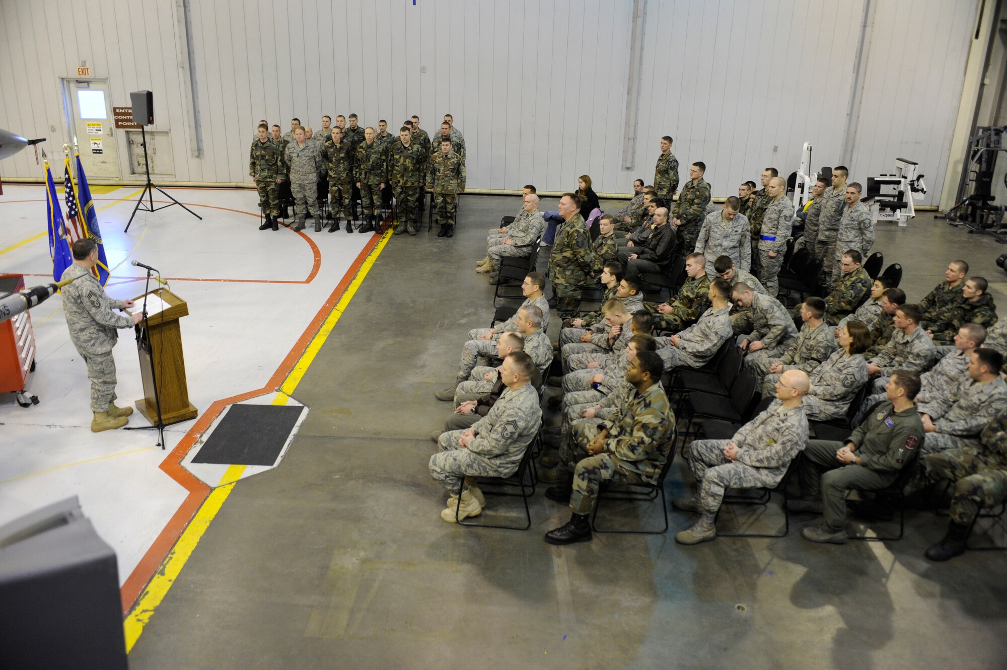 Chief Master Sgt. Charles Hammerle speaks to Airmen being honored during the dedicated crew chief ceremony Nov. 21, 2008, at Eielson Air Force Base, Alaska. Dedicated crew chiefs are responsible for the people who work for them, they are also responsible for every maintenance action on a particular aircraft: all the paperwork and most importantly for the aircraft's mission readiness.  (U.S. Air Force photo/Senior Airman Jonathan Snyder)