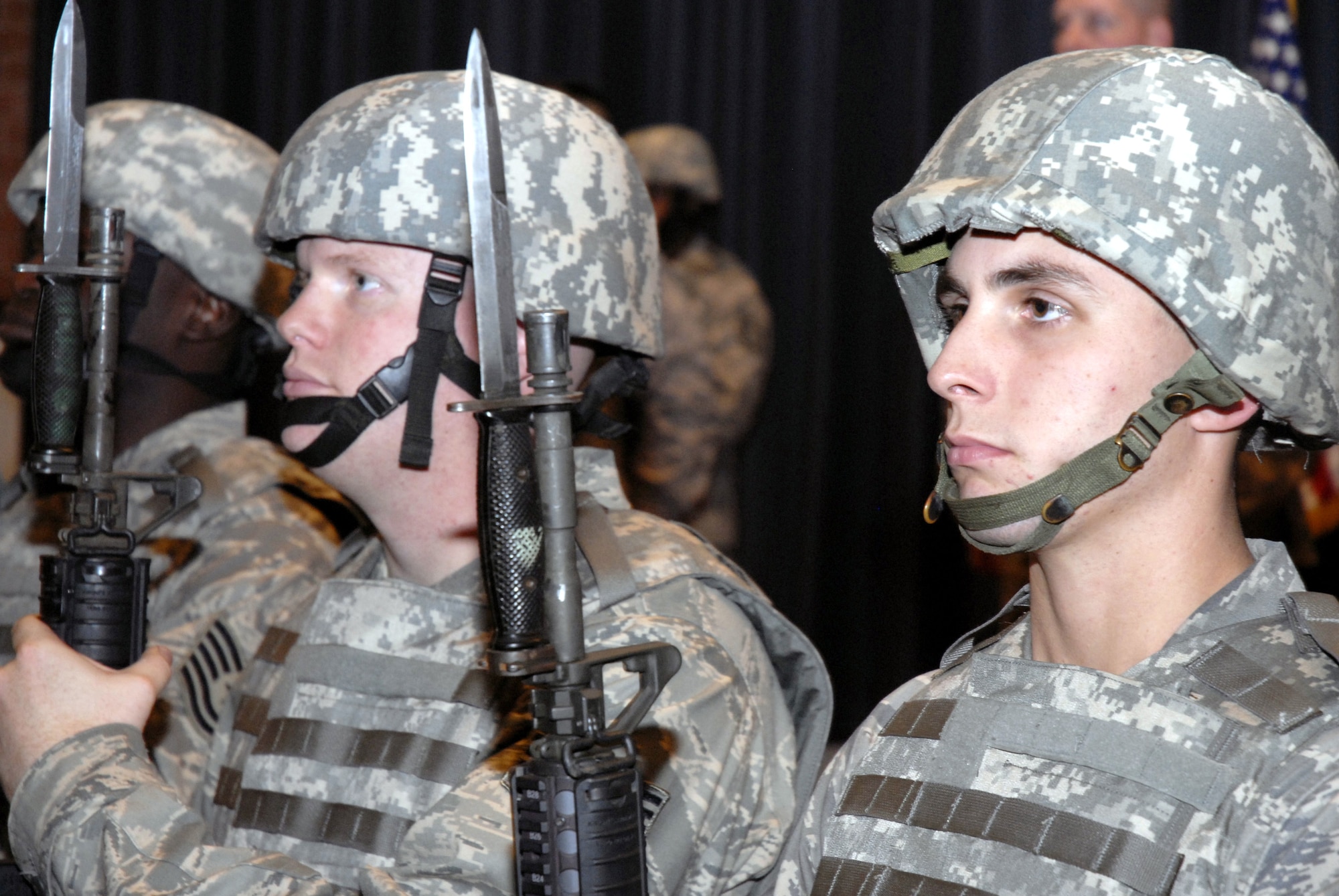 Security forces Airmen from the U.S. Air Force Expeditionary Center stand in a formation of more than 20 during the Order of the Bayonet induction ceremony Nov. 24, 2008, for Master Sgt. Jason Parker in the USAF EC's Grace Peterson Hall on Fort Dix, N.J.  Sergeant Parker, now stationed at the 92nd Security Forces Squadron at Fairchild Air Force Base, Wash., was nominated for the award while serving as a member of the Expeditionary Center's 421st Combat Training Squadron. (U.S. Air Force Photo/Staff Sgt. Paul R. Evans)
