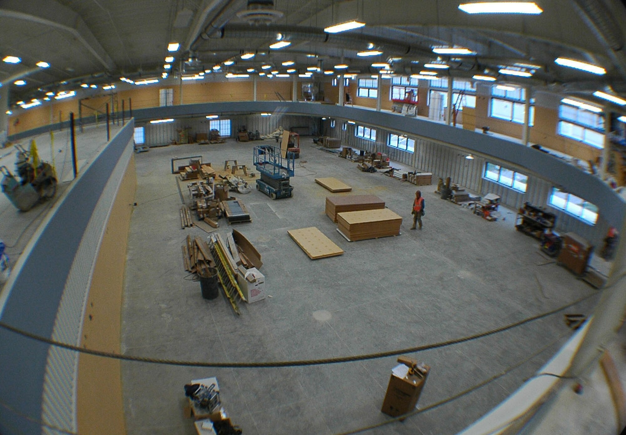 The 1/8 mile suspended running track surrounds the lower floor of the new fitness center, which will provide space for cardiovascular and weight training equipment. The mezzanine will be used as a group warm-up area and overlooks the first floor. (U.S. Air Force photo/Senior Airman Dillon White)