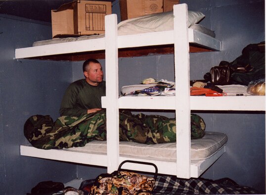 Tech. Sgt. Matthew Sutton, 341st Operations Group NCO in charge of supply, relaxes on his bunk at the beginning of his hunting trip to Kodiak Island, Alaska, in October. (Courtesy photo)