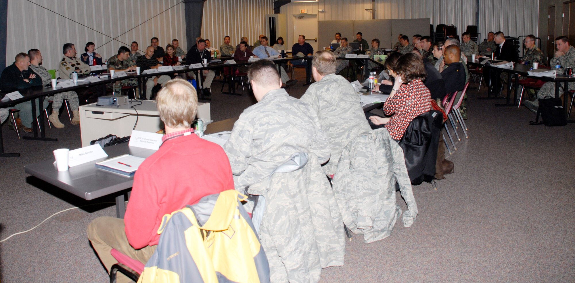 More than 50 disaster preparedness, first responders and emergency personnel from the 934th Airlift Wing, the 133rd Airlift Wing (Air National Guard) and various civilian organizations participated in a two day All Hazards Response Training here Nov. 20-21. The two tabletop exercises, which focused on responding to pandemic outbreak and bomb threats, not only trained participants but fostered teamwork  between different military  branches and their civilian counterparts. (Air Force Photo/Master Sgt. Paul Zadach)  