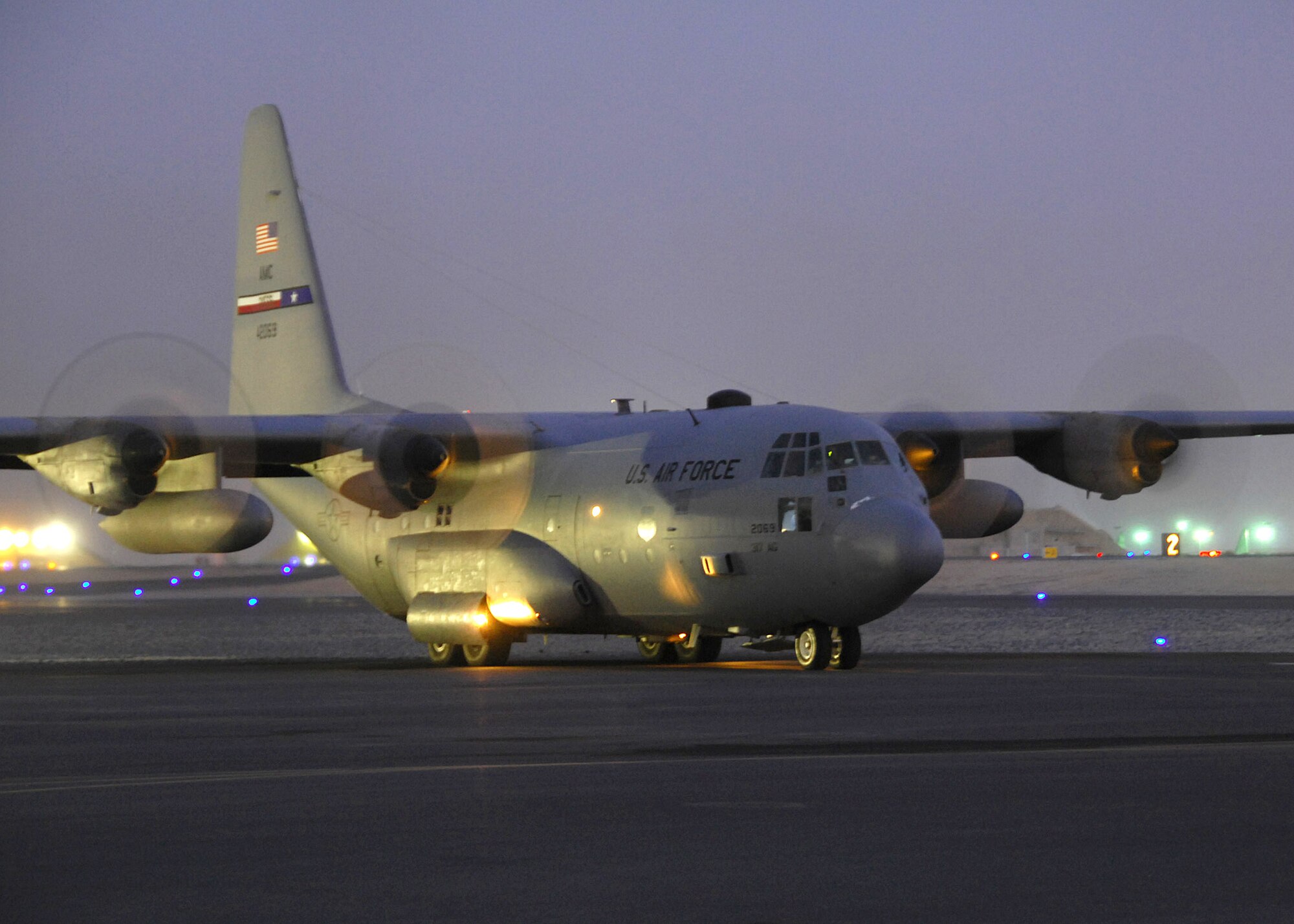 A C-130 Hercules prepares to depart a Southwest Asia air base on a sortie en route to Iraq. The C-130s are vital to transporting passengers and cargo, providing intra-theater heavy airlift and supporting operations throughout Afghanistan, Iraq and the Horn of Africa. The C-130 is assigned to the 386th Expeditionary Operations Group. (U.S. Air Force photo/Tech. Sgt. Raheem Moore)