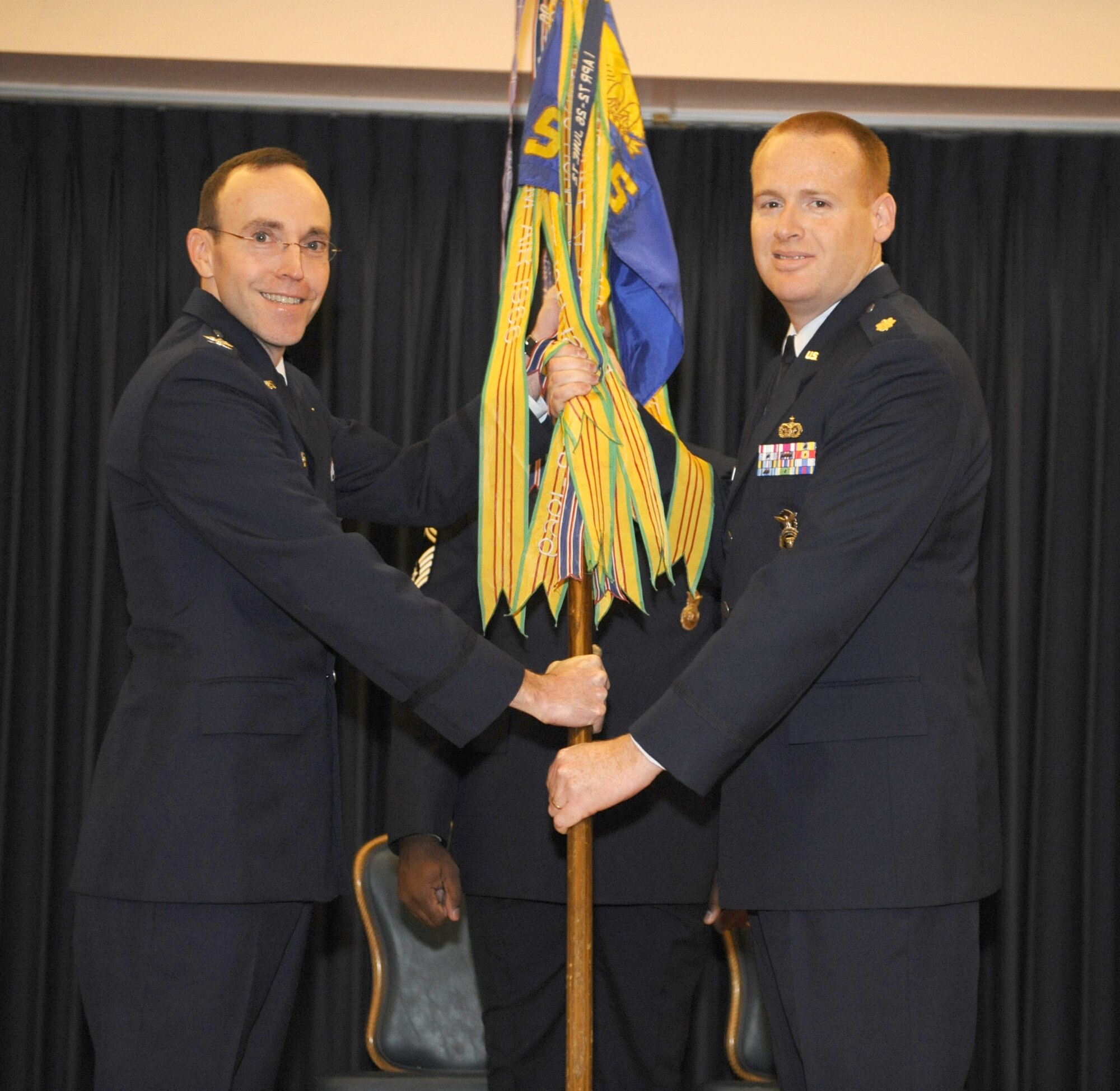 MOUNTAIN HOME AIR FORCE BASE, Idaho -- Maj. Earl Layne assumes command of the 366th Security Forces Squadron from Col. Jeffrey Maxwell, 366th Mission Support Group commander, in an assumption-of-command ceremony Nov. 17 at the Gunfighters Club. (U.S. Air Force photo/ Airman 1st Class Stephany Miller)