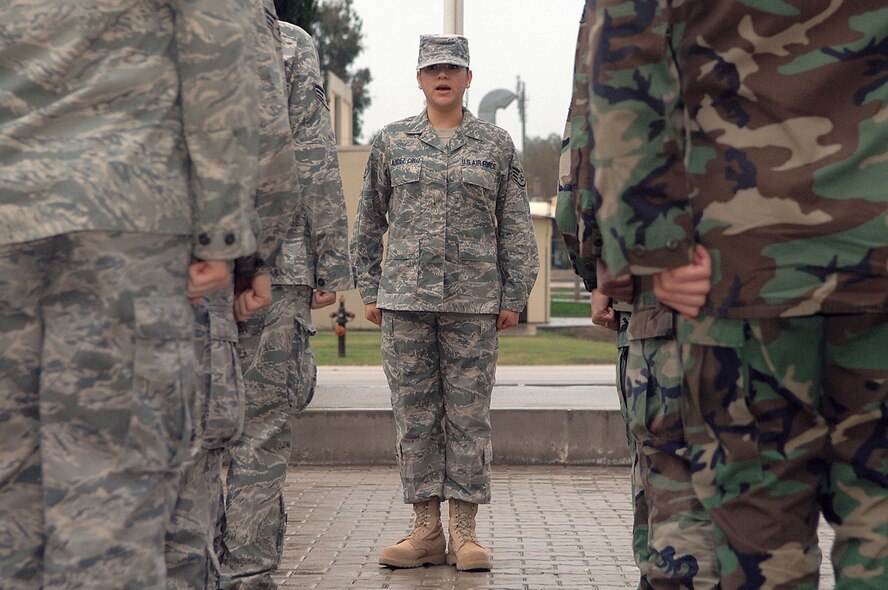 Staff Sgt. Evelyn Mendez-Cruz, 39th Communications Squadron, prepares a flight of Airman Leadership School Airmen for reveille Nov. 25. Airman Leadership school prepares and trains future noncomissioned officers for increased responsibilities. (Photo by Senior Airman Erica Stewart)