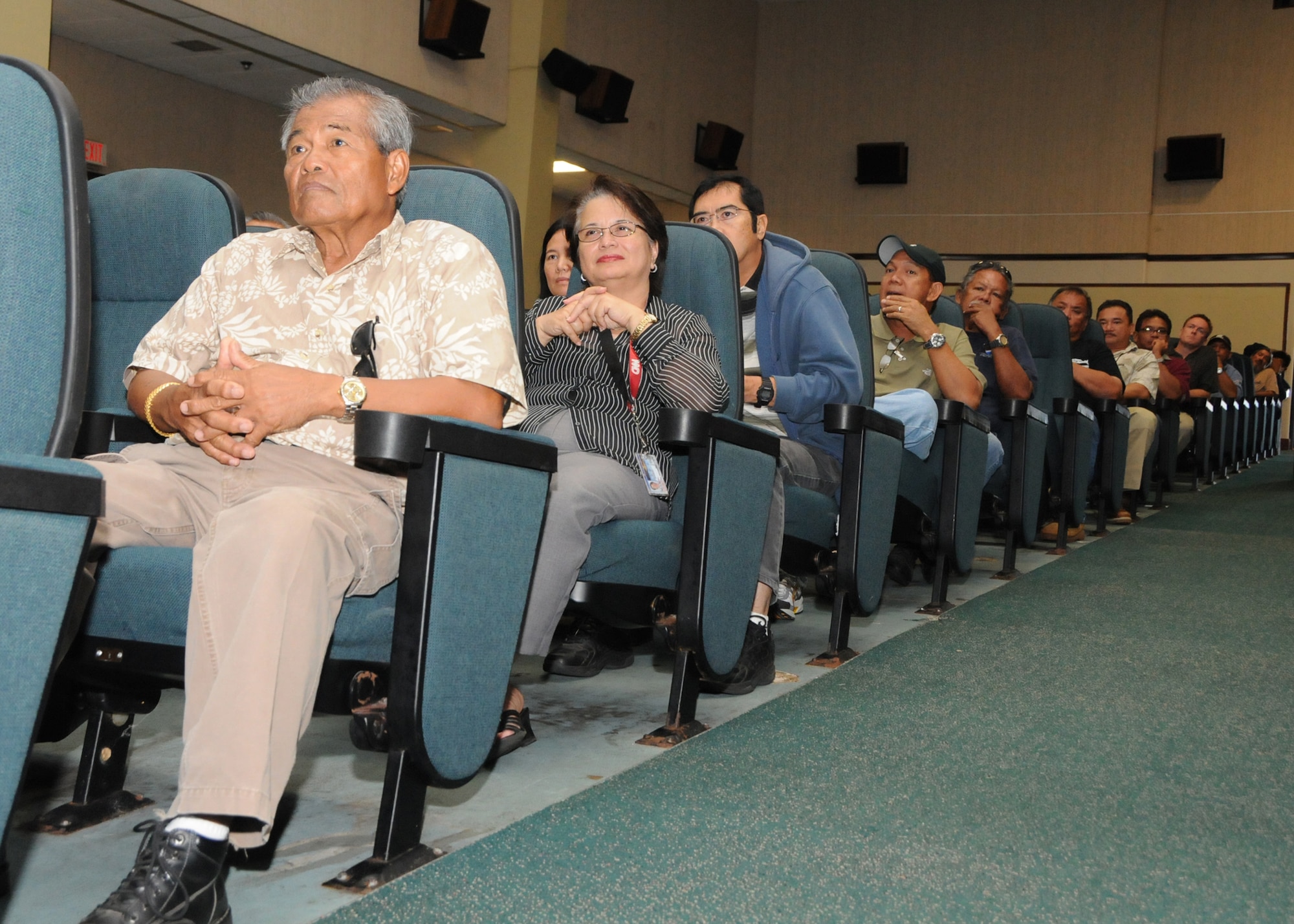 ANDERSEN AIR FORCE BASE, Guam - Air Force Civilians listen as Brig. Gen. Ruhlman speaks about joint basing and what the future holds for these employees during a Town Hall Meeting Nov. 21 at the base theater. (U.S. Air Force photo by Senior Airman Nichelle Griffiths)