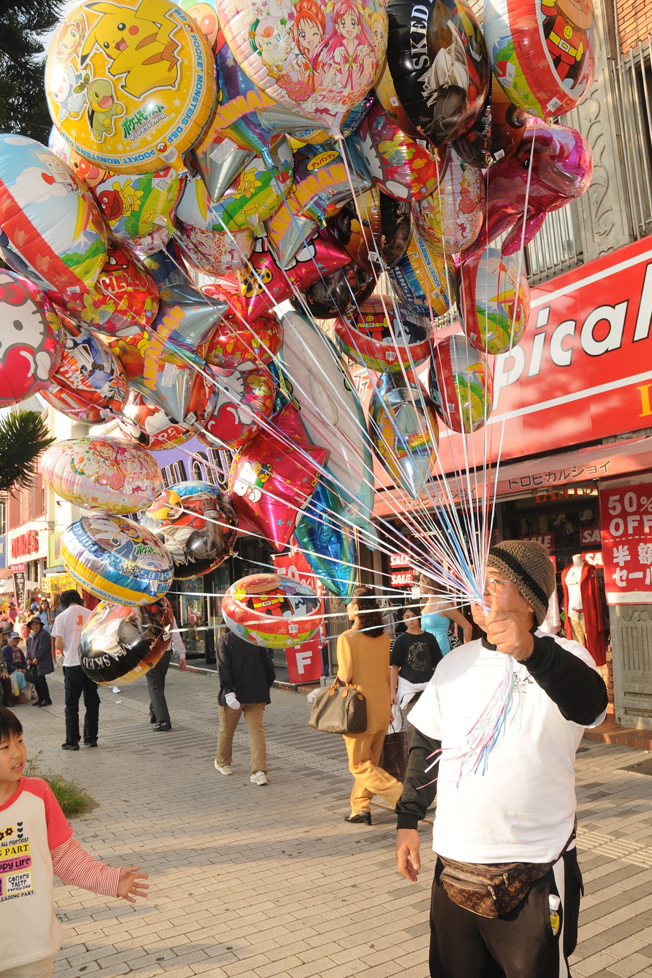 A vendor sells balloons during the Okinawa International Carnival held in Okinawa City, Japan Nov. 22, 2008. The carnival included a parade featuring dances and acts from different cultures in celebration of the city's diversity.  (U.S. Air Force photo/Airman 1st Class Chad Warren)