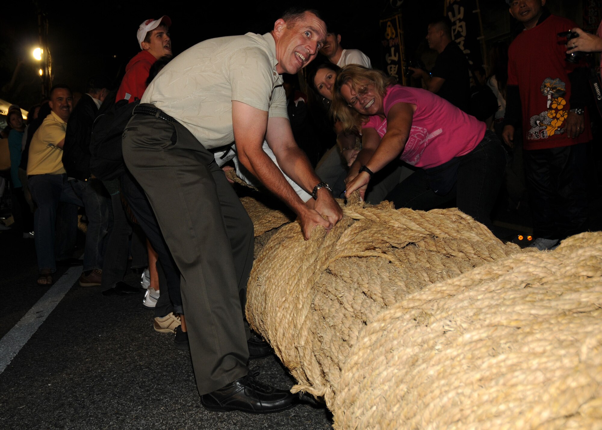 Brig. Gen. Brett Williams, 18th Wing commander, participates in the famous tug-of-war at the Okinawa International Carnival Nov. 22, 2008 near Kadena Air Base.  The Okinawa International Carnival is held every year with events from car shows and dancing, to a giant rope for tug-of-war.(U.S. Air Force photo/Airman 1st Class Amanda Grabiec)