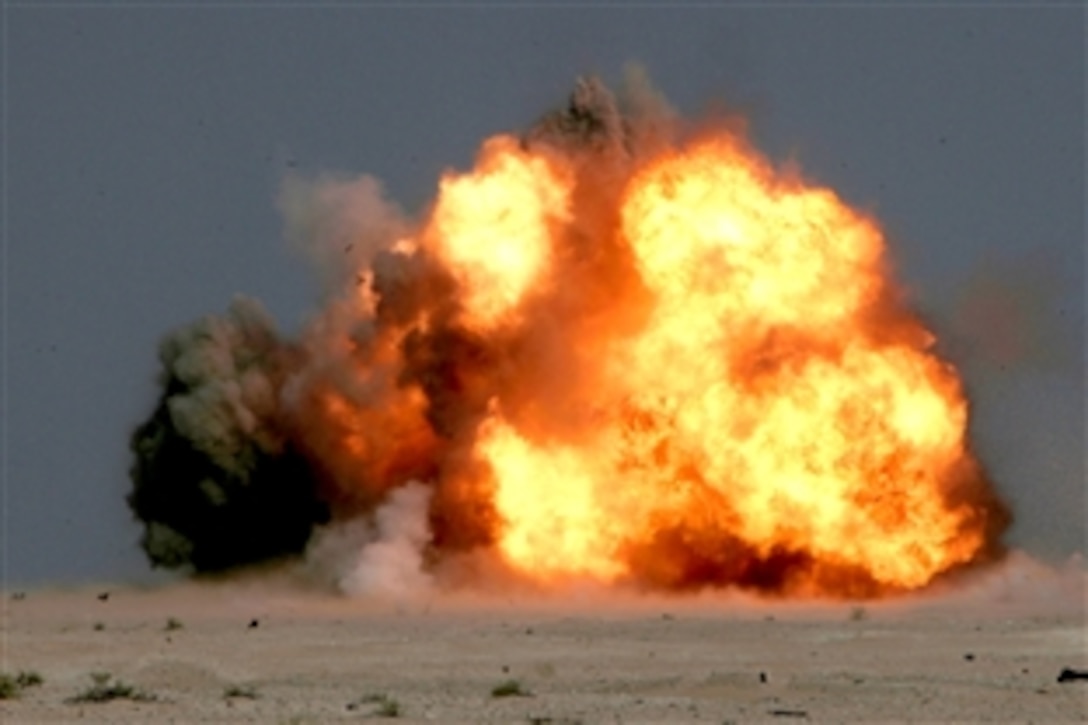 Unexploded ordnance is detonated by the 26th Marine Expeditionary Unit's explosive ordnance disposal Marines at a training site in the Middle East, Nov. 17, 2008. The Marines safely cleared hundreds of pounds of unexploded ordnance found on a range, which was later used for training.