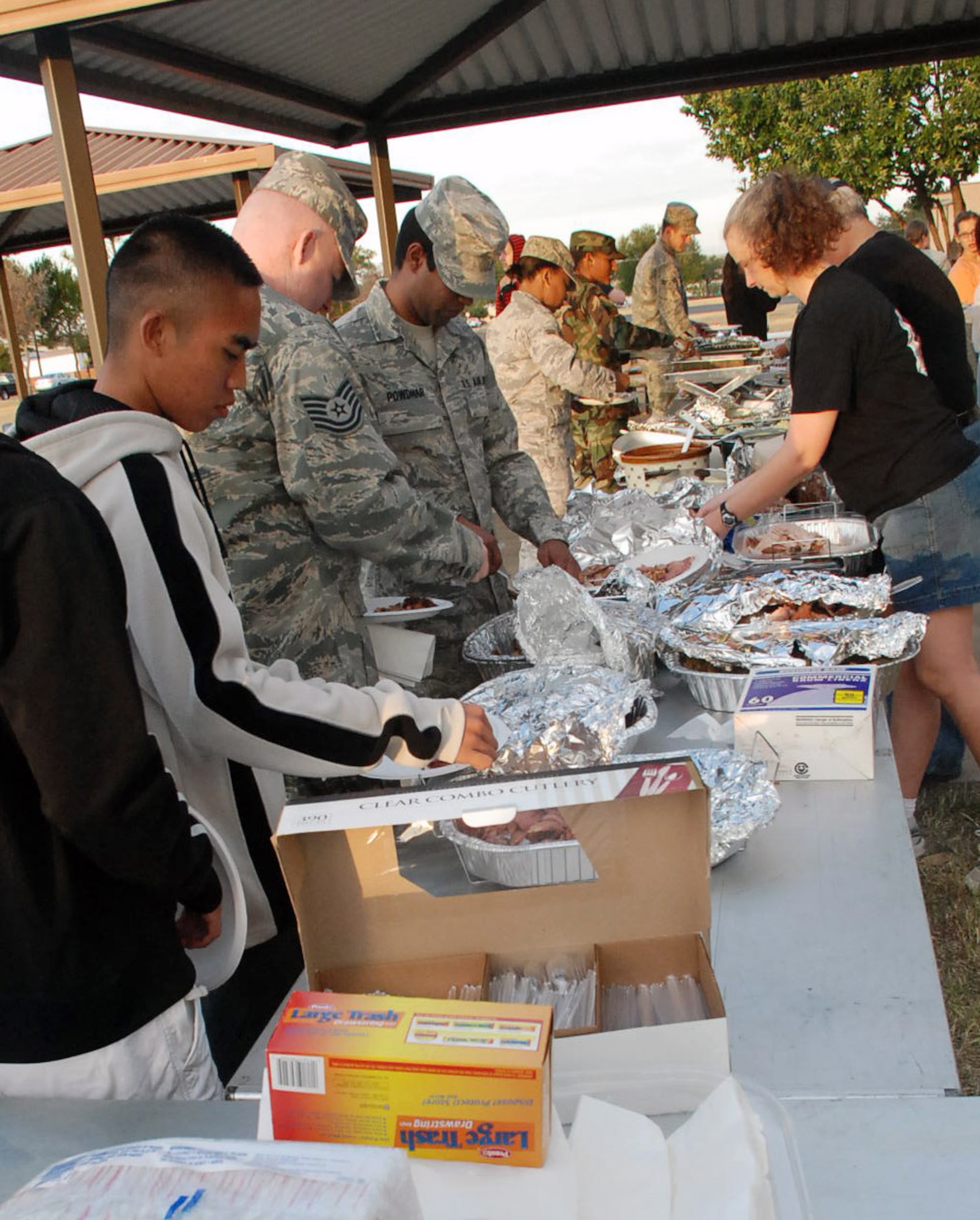 Airmen from the Enlisted dormitories celebrate Thanksgiving early
