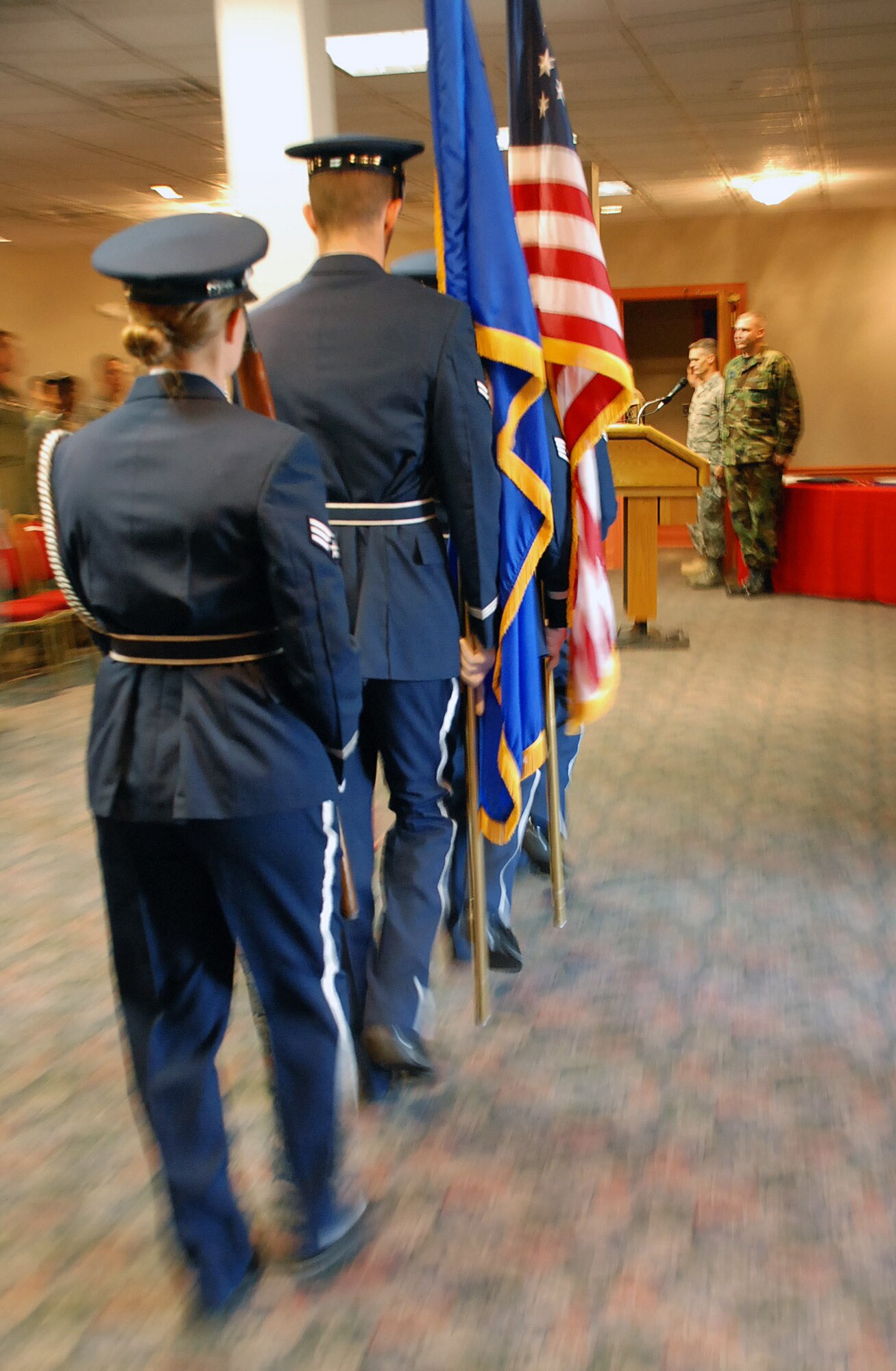LAUGHLIN AIR FORCE BASE, Texas -- Members of the Laughlin honor Guard march to the front of Laughlin’s Club XL to perform a detail at the 47th Flying Training Wing recognition ceremony here Nov. 25. (U.S. Air Force photo by Airman 1st Class Sara Csurilla)