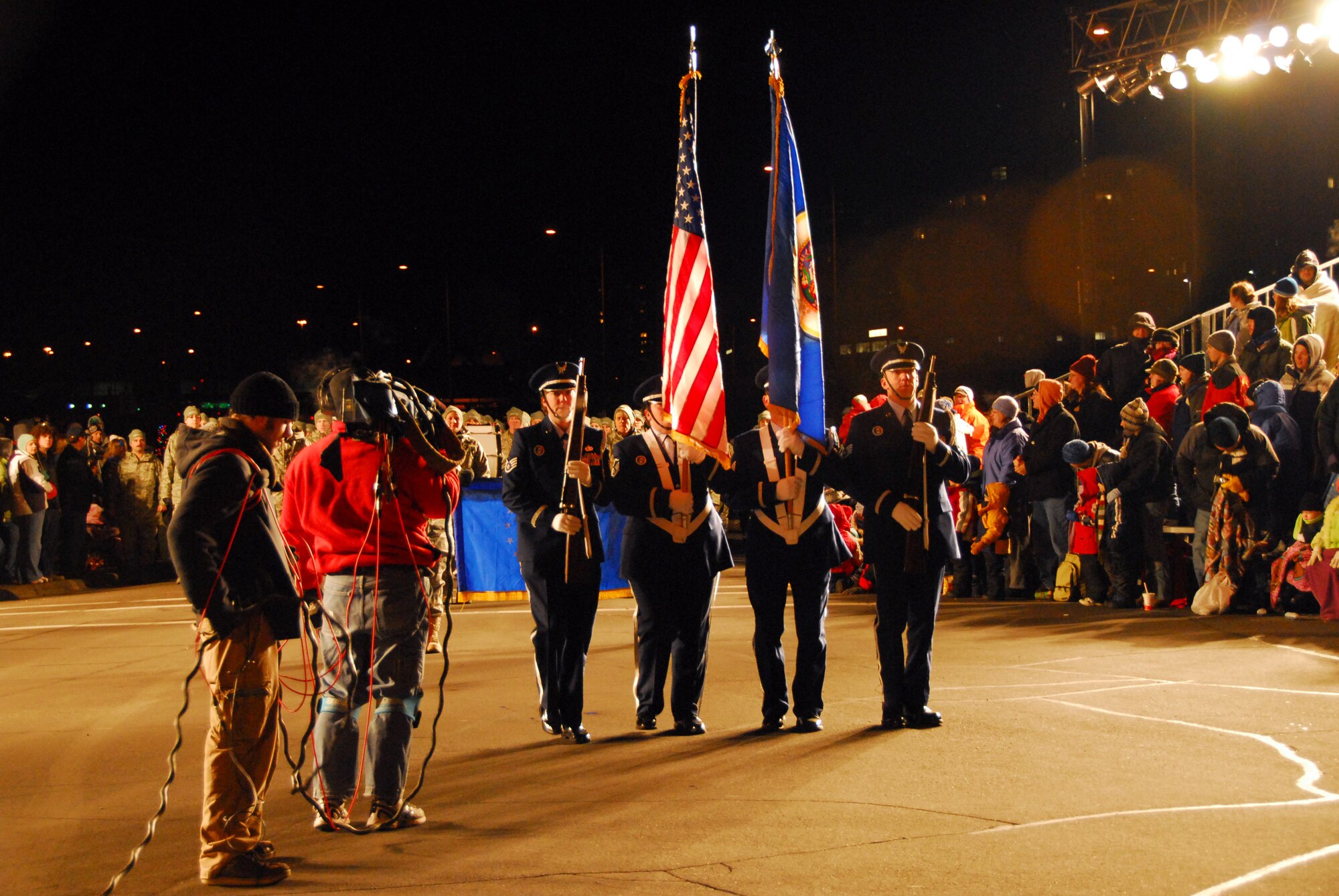 148th Fighter Wing Honor Guard followed by members of the wing leads the 50th Annual Christmas City of the North Parade in Duluth, Minn. Nov. 21, 2008.  The Christmas City of the North Parade dates back to 1958, when KBJR (then WDSM) started the event as a way to kick off the holiday season in the Northland and has been held every year since. (U.S. Air Force photo by TSgt Jason W. Rolfe) (Released)