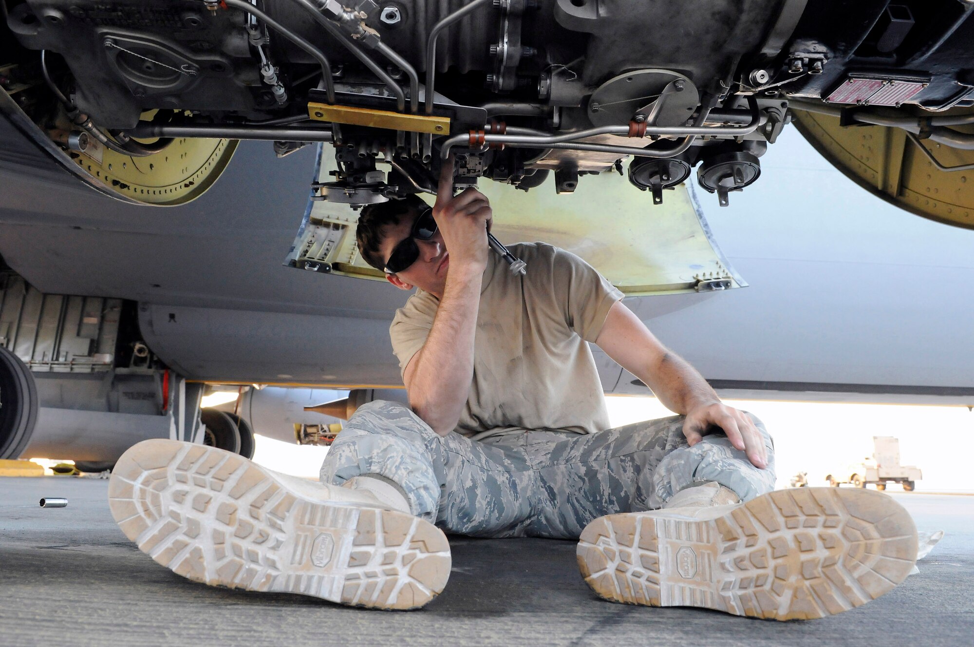 Airman 1st Class Alexander Lesch attaches safety wire securing a nut during a 120-hour inspection on a KC-135 Stratotanker engine Nov. 20 at an air base in Southwest Asia. KC-135s provide the core aerial refueling capability for the Air Force and support to Navy, Marine Corps and allied nation aircraft in the U.S. Central Command area of responsibility. Airman Lesch is a native of Burlington, Wis., and is deployed from Grand Forks Air Force Base, N.D. He is assigned to the 379th Expeditionary Aircraft Maintenance Squadron. (U.S. Air Force photo/Tech. Sgt. Michael Boquette) 
