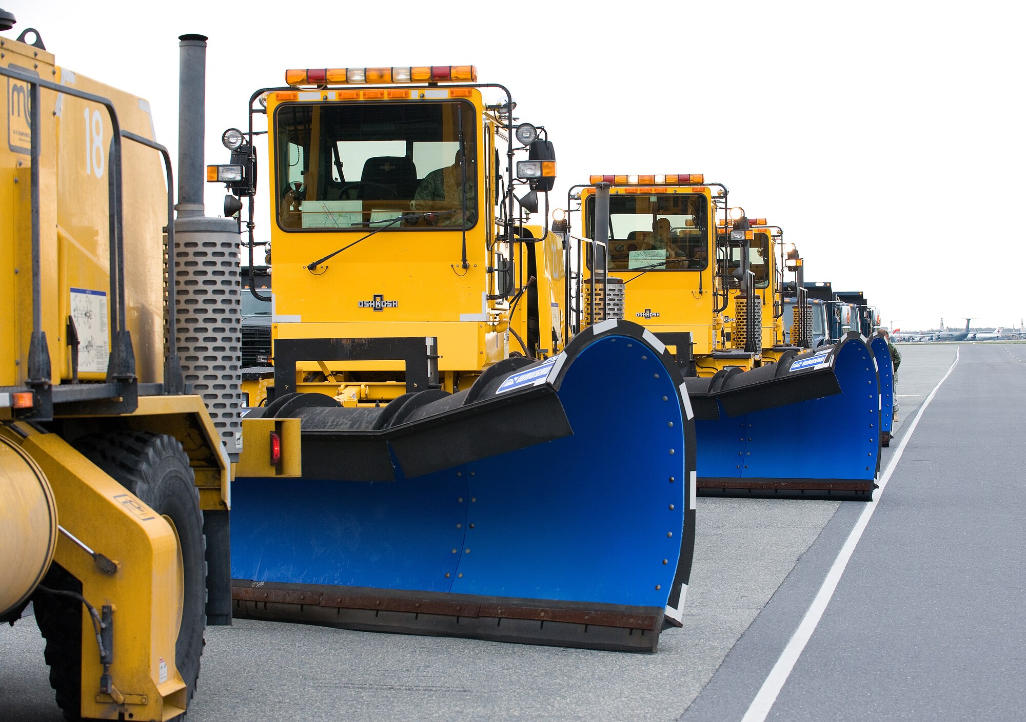 The 436th Civil Engineer Squadron held the annual snow plow parade Nov. 20 to demonstrate their snow-removal capabilities to 436th Airlift Wing leadership.  (U.S. Air Force photo/Tom Randle)